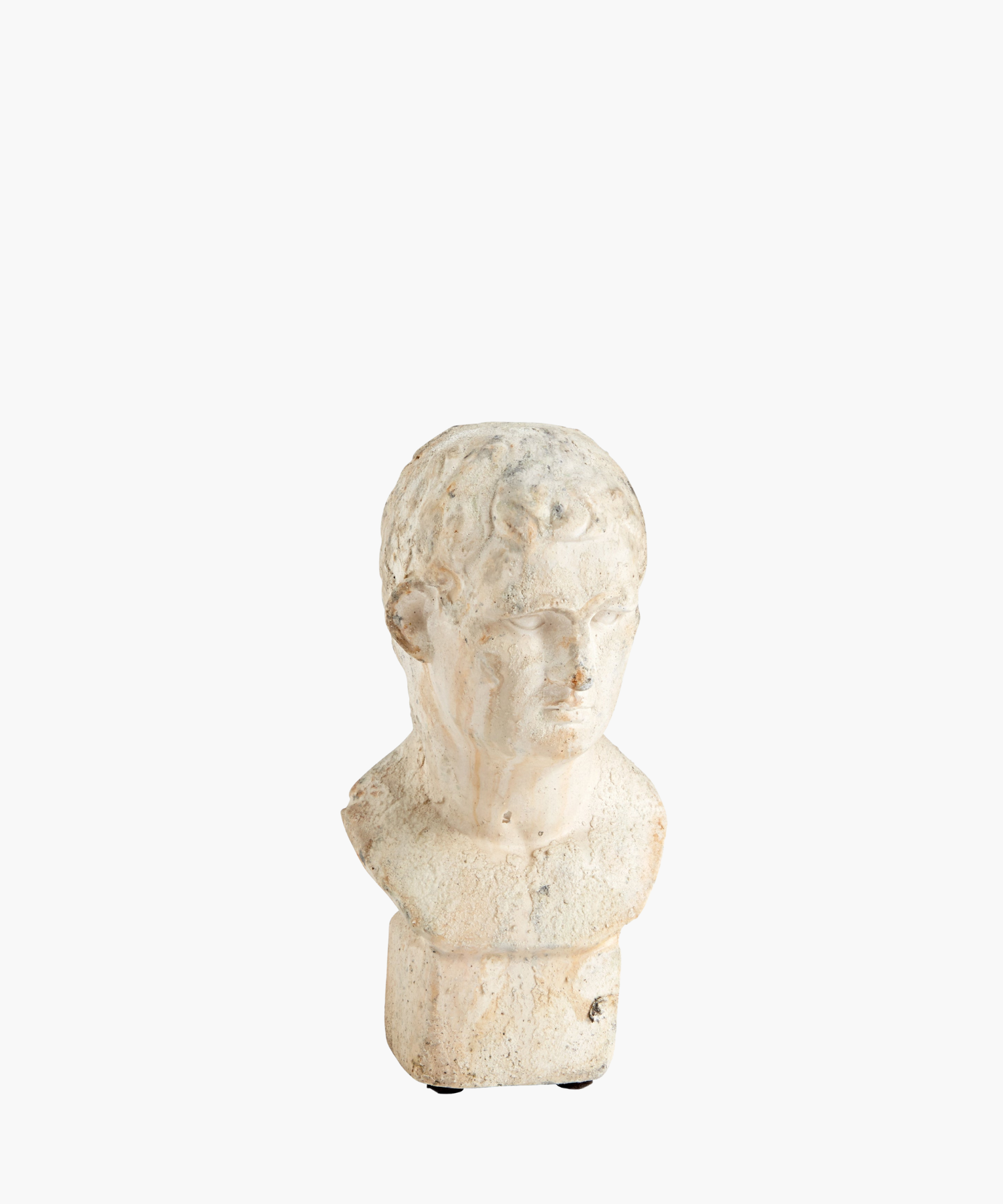A weathered marble bust of a male figure with short hair, expressionless face, and chipped surface, evoking a sense of ancient history and timelessness. | SW Home