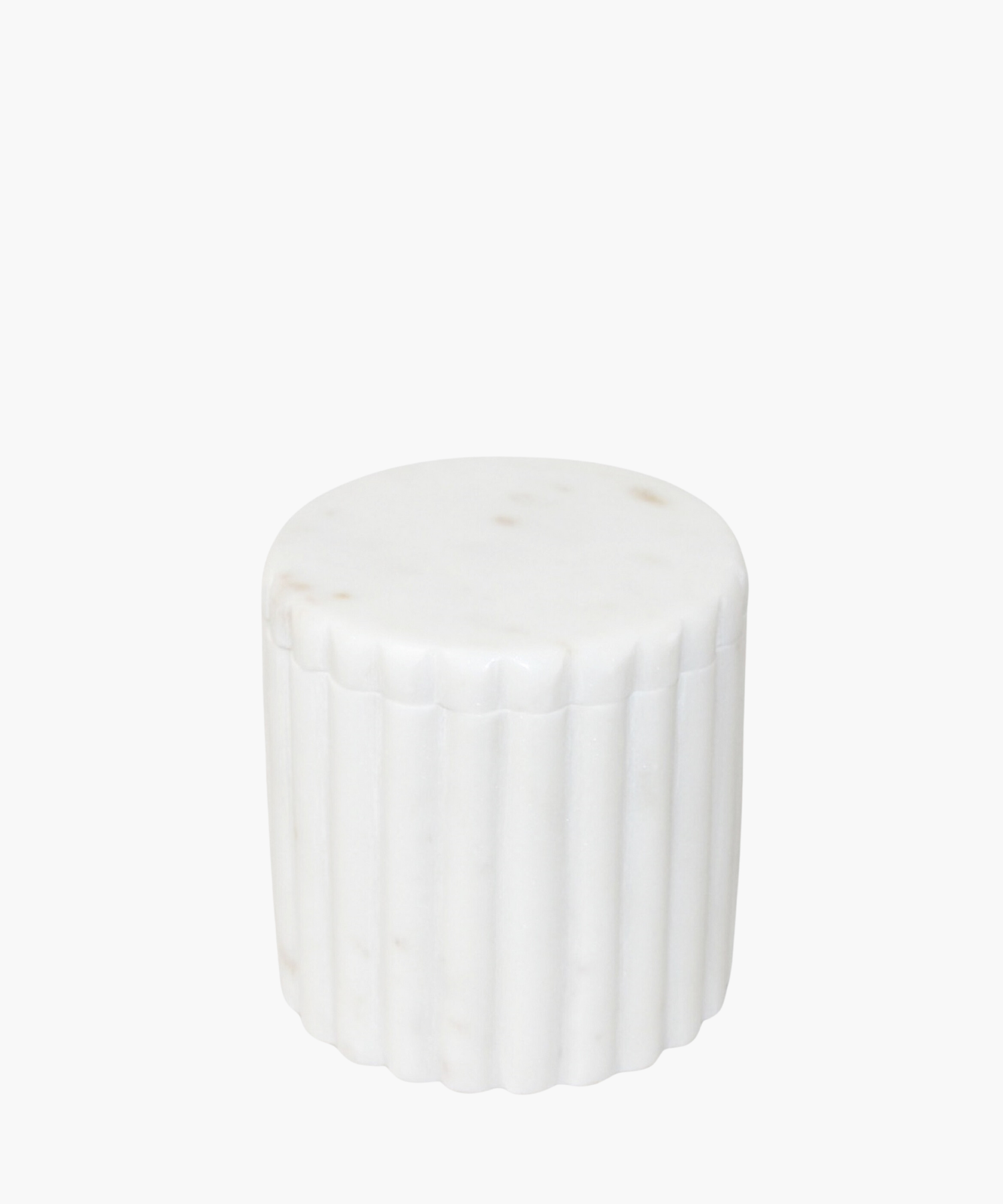 A white cylindrical canister made of smooth marble, with vertical grooves along its sides. The design is sleek and minimalist, conveying a modern aesthetic. | S.W. Home