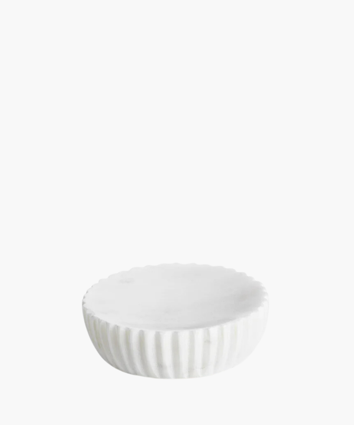 Round white marble soap dish with a scalloped edge and fluted sides. The sleek, minimalist design conveys elegance and simplicity. | S.W. Home