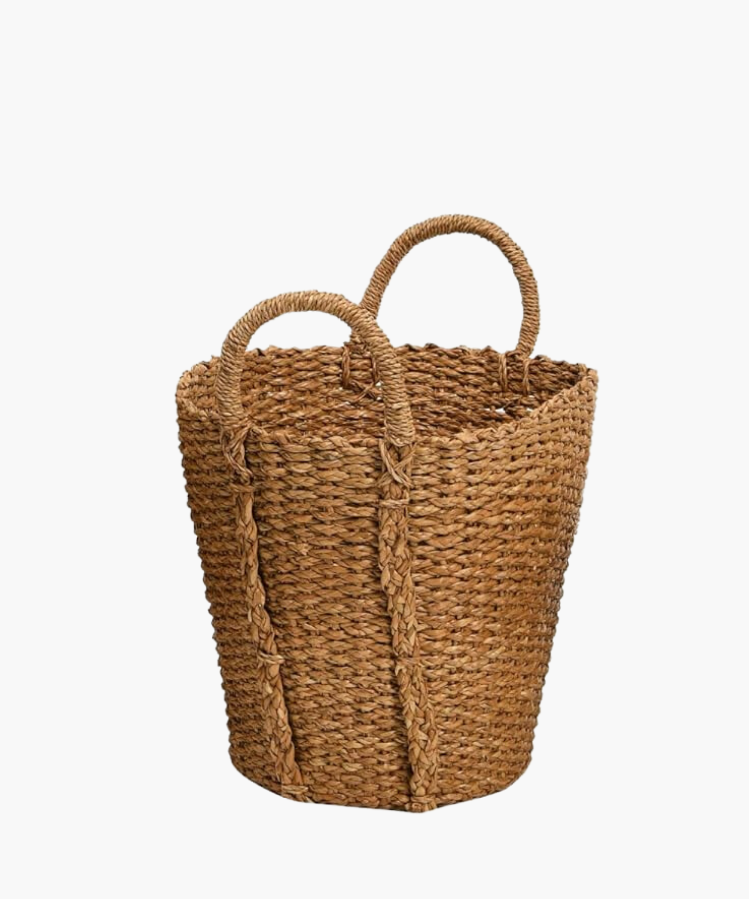 A hand woven basket with two sturdy looped handles. The basket's braided texture conveys a rustic and natural feel, perfect for storage or decoration. | Wildwood Home Co.