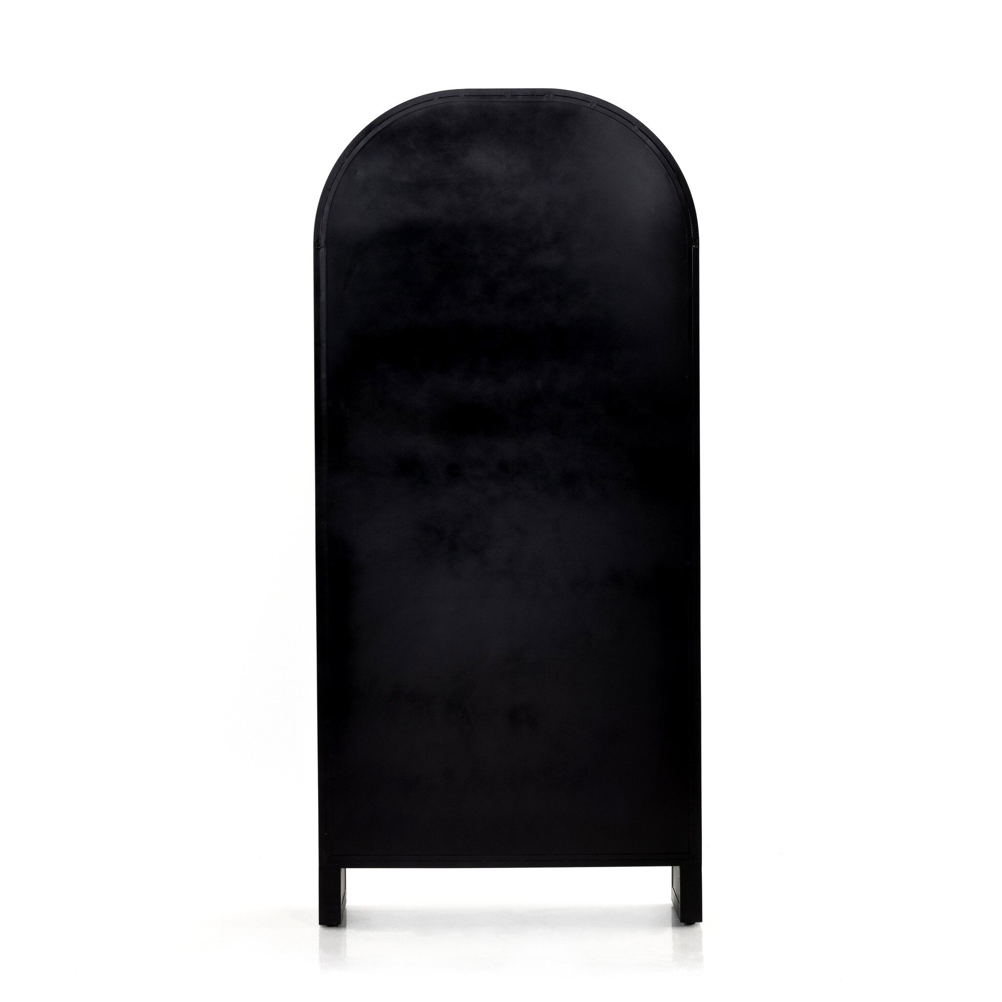 The back of a black-finished iron arched cabinet with glass front doors.