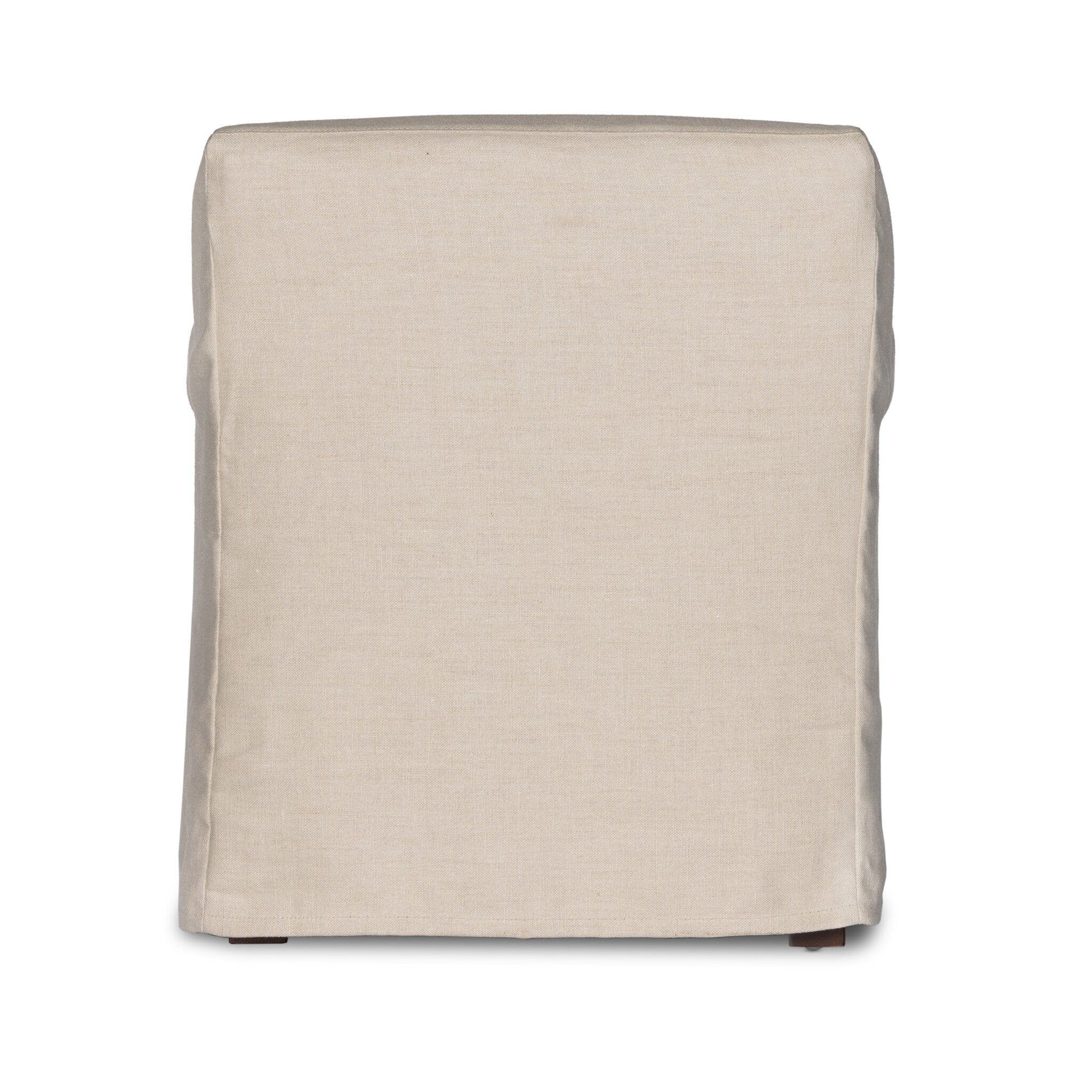 The back of a natural slipcovered dining armchair with rolled arms on a white background.