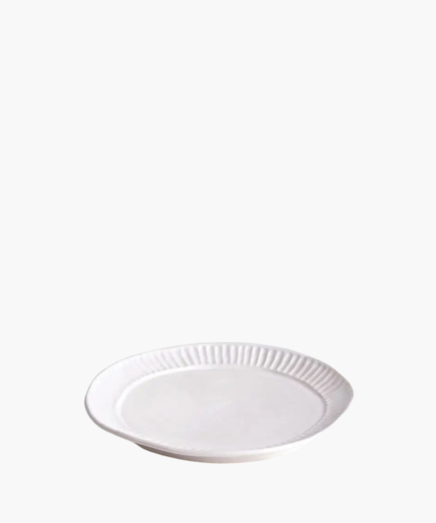 White ceramic plate with decorative rim on a white background. | SW Home