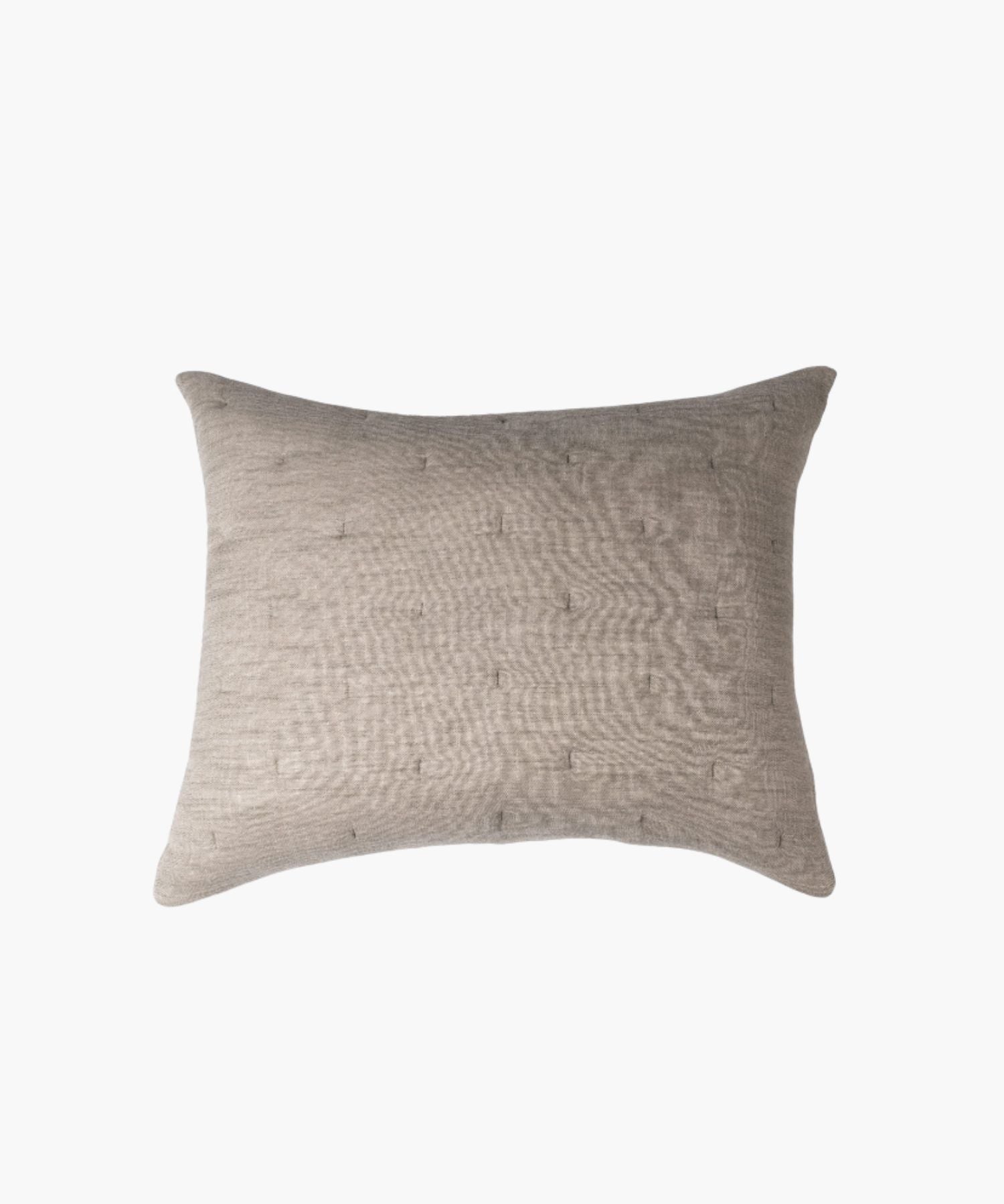 Rectangular beige textured pillow on a white background highlighting fabric texture, stitching, and finish. | S.W. Home