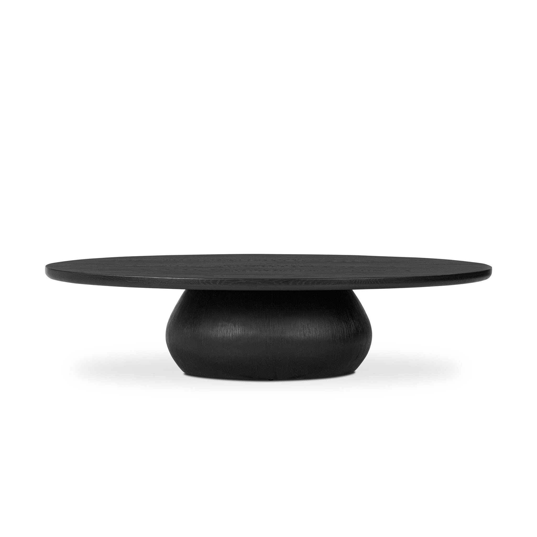 Black oval shaped coffee table on a white background. | S.W. Home