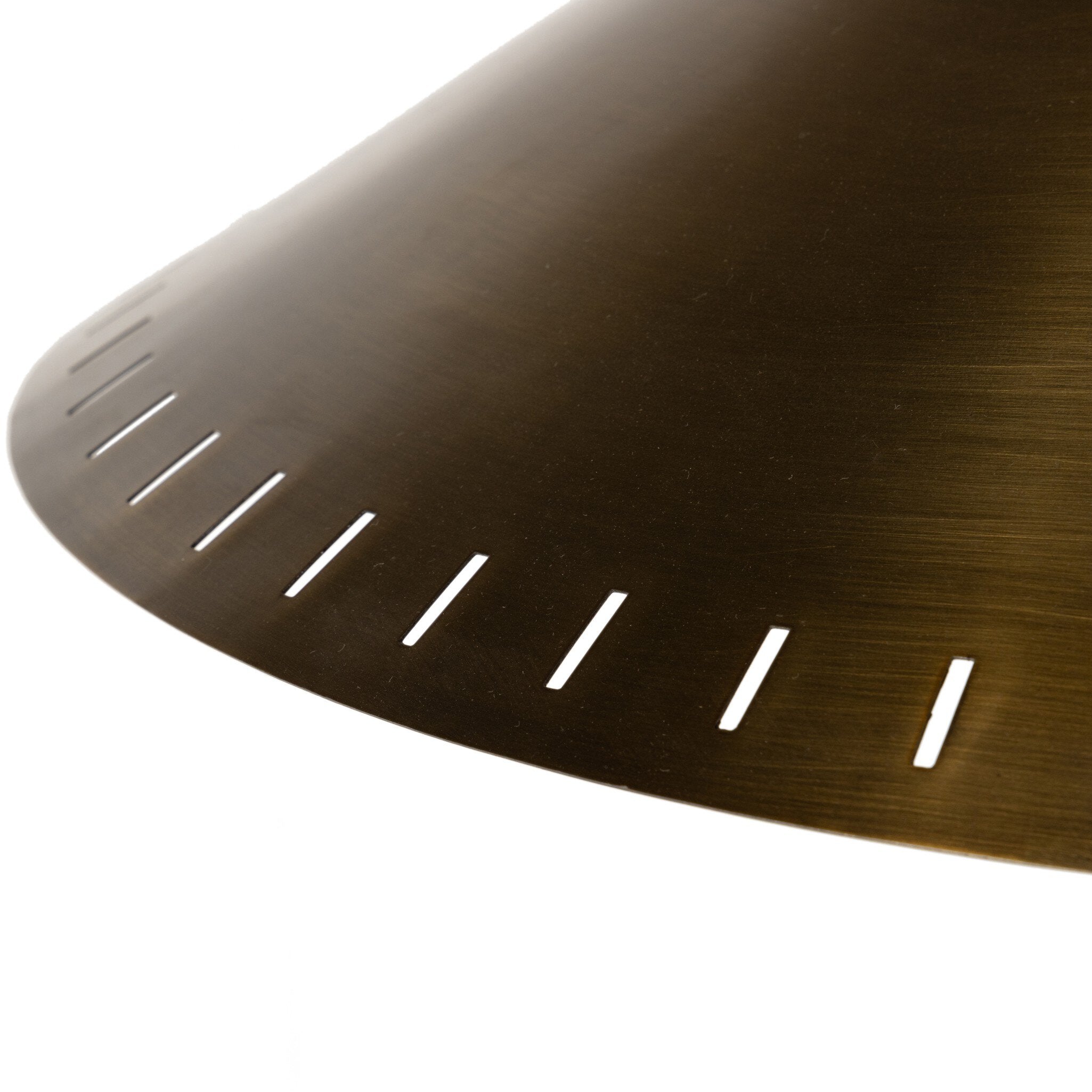 Close up of the tall floor lamp with a antique brass shade on a white background.