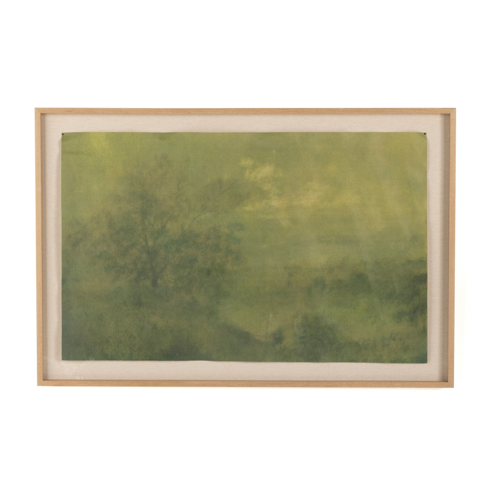 Framed artwork with a green abstract design on a white background. | Wildwood Home Co.