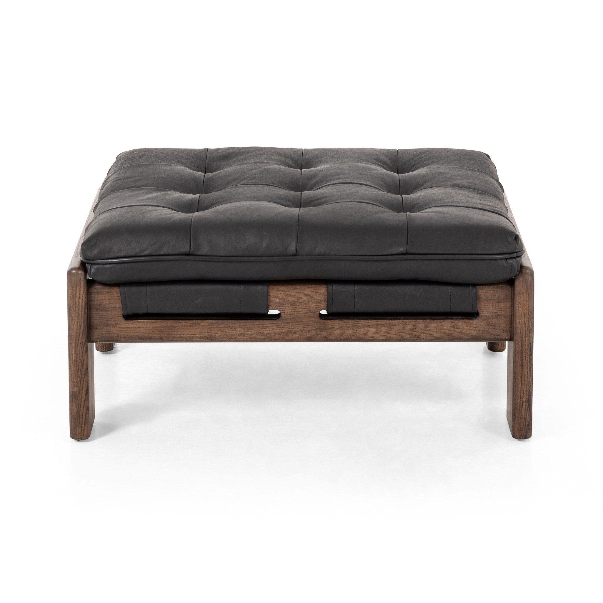 Black leather cushioned ottoman with wooden frame on a white background. | S.W. Home