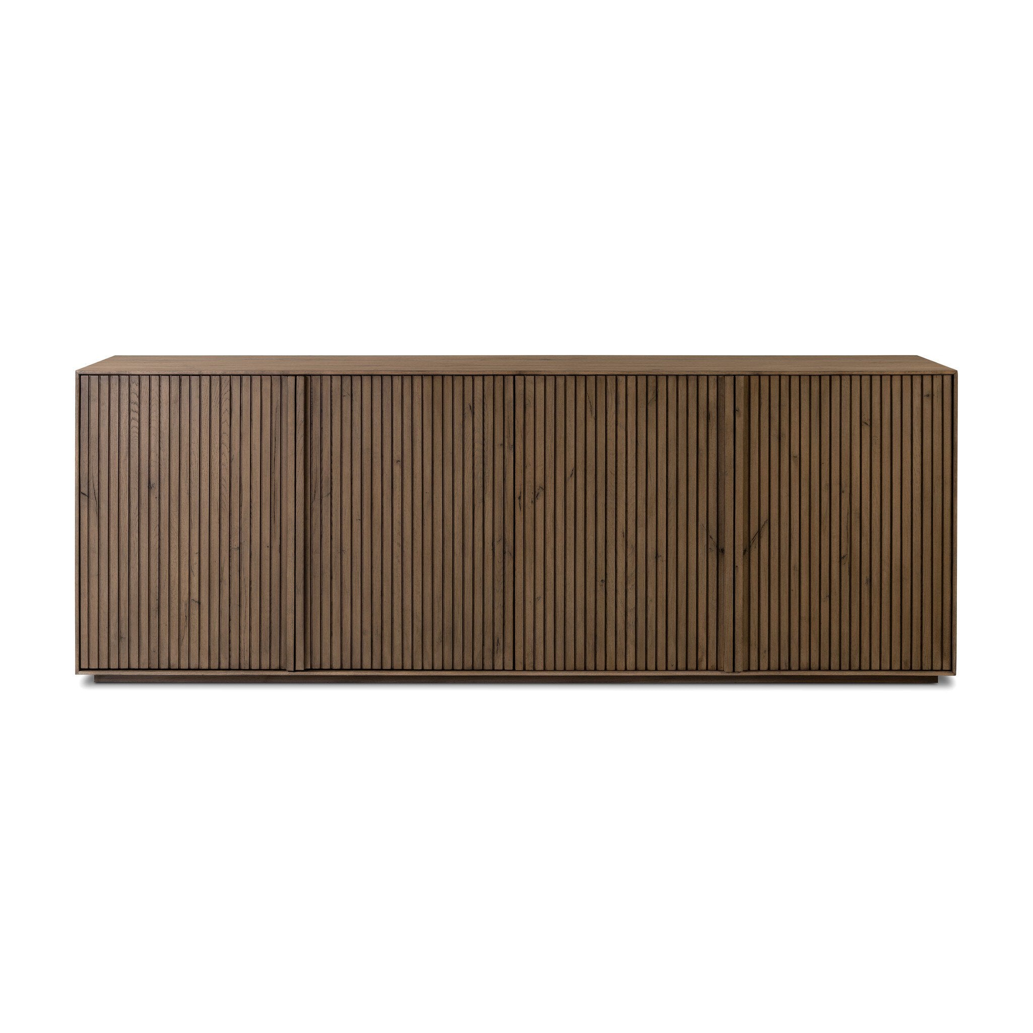 Wooden sideboard with vertical reeding on a white background. | S.W. Home