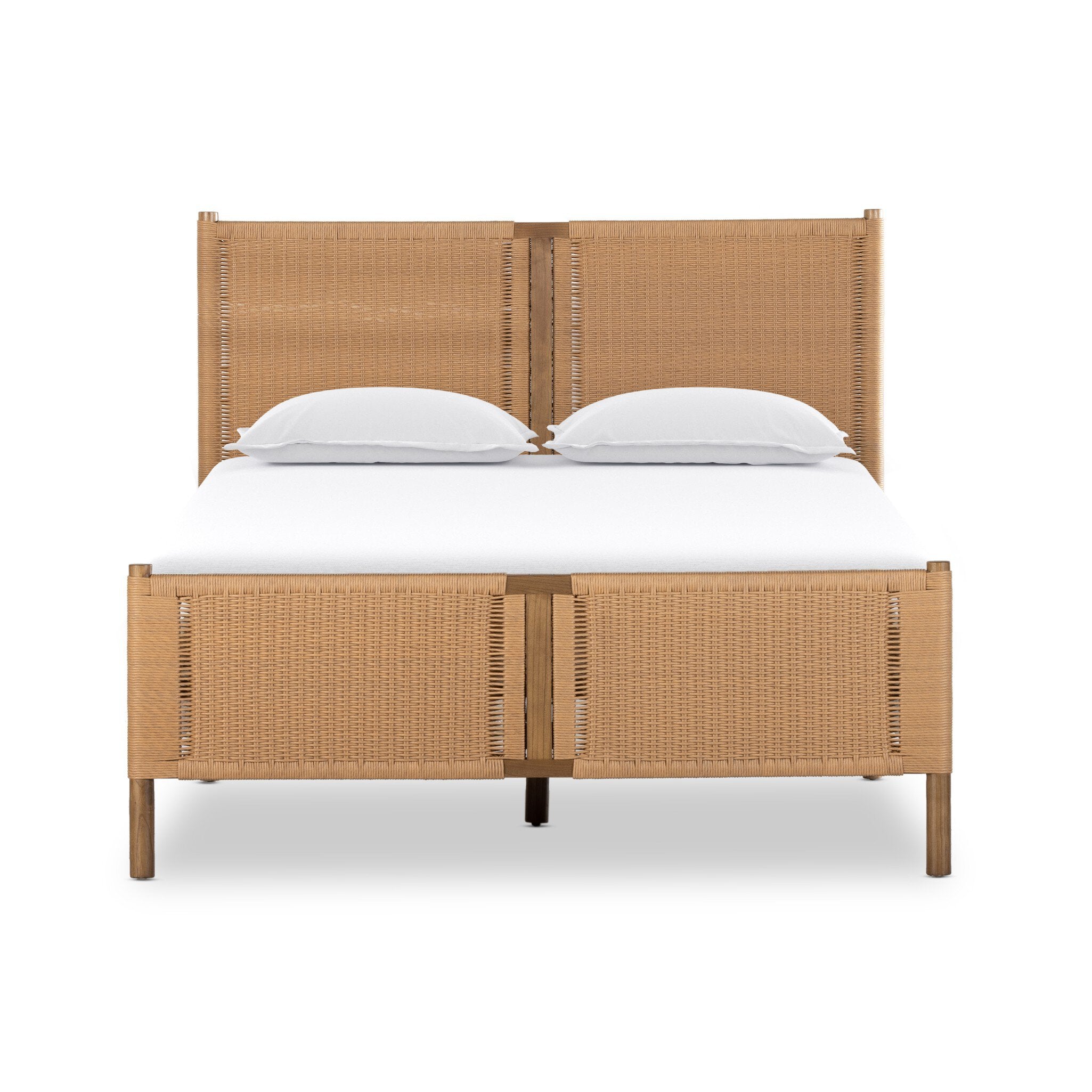 Wicker bed with white bedding on a white background. | SW Home