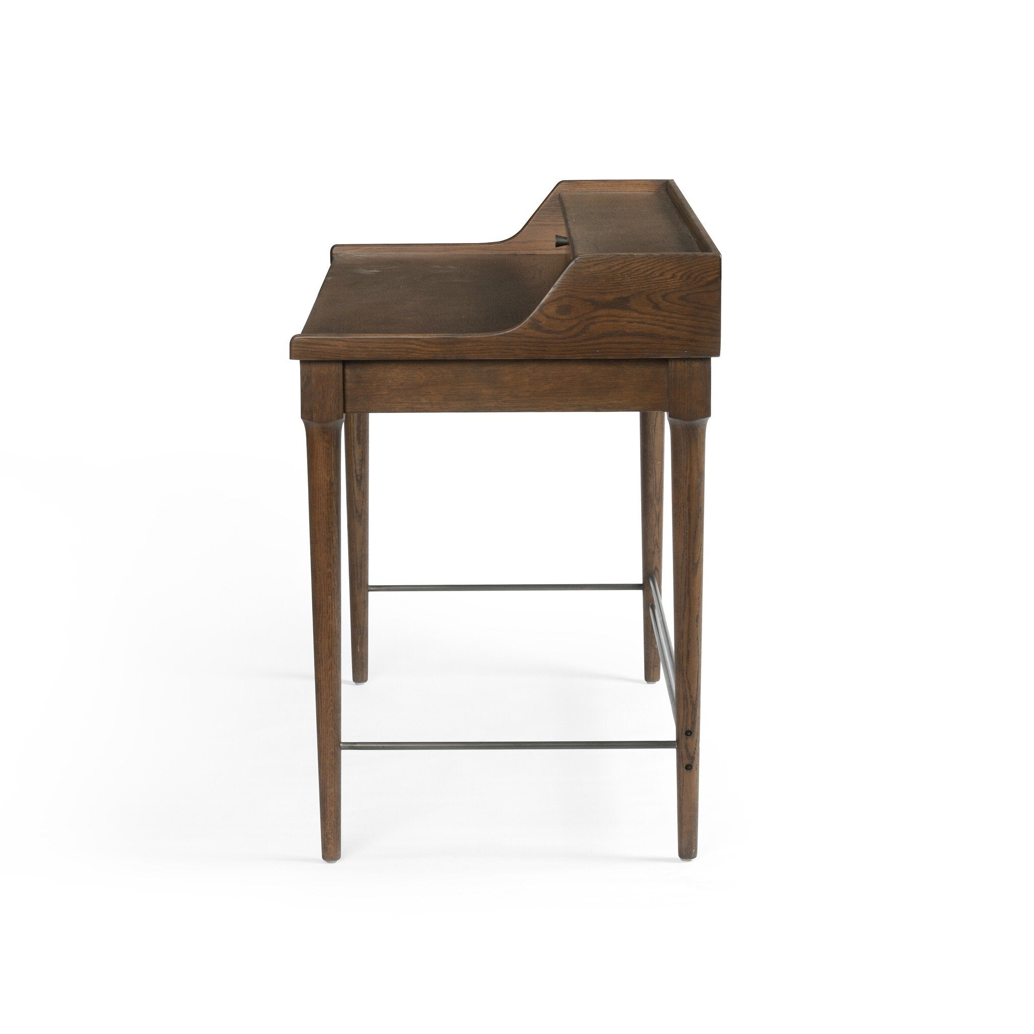 Side profile of a wooden desk with drawers on a white background.