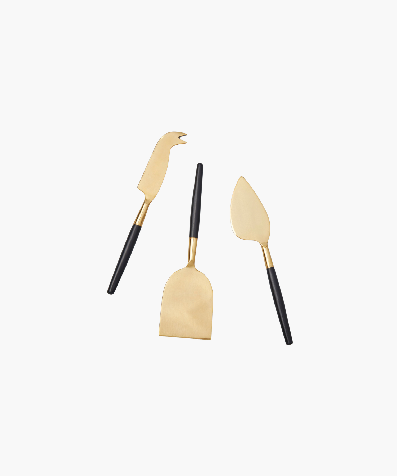 Three elegant cheese knives with gold blades and black handles are arranged on a white background, conveying a sleek and modern aesthetic. | S.W. Home