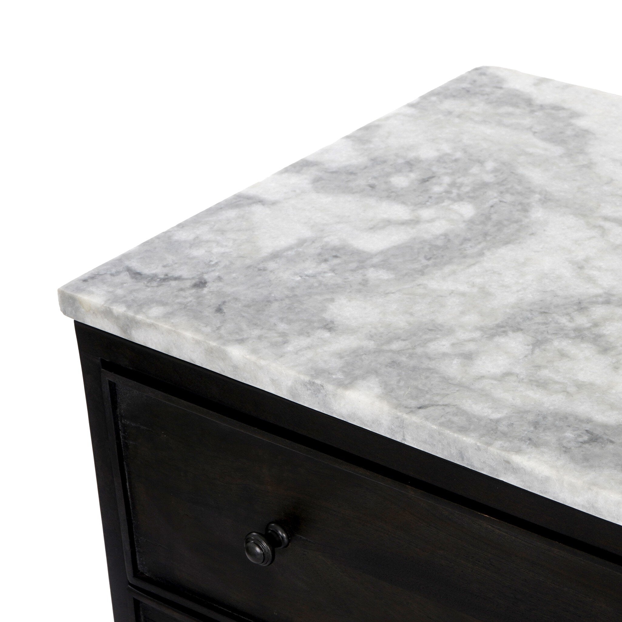 Close up of a dark wood stained nightstand with three drawers and a marble top.