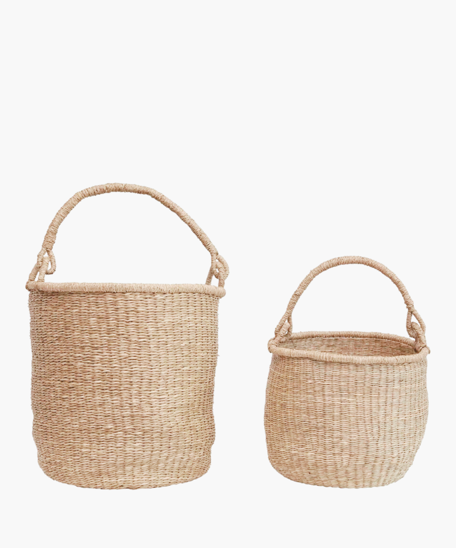 Hand-woven seagrass baskets with sturdy handle in 2 sizes, showcasing natural beige tones. | Wildwood Home Co.