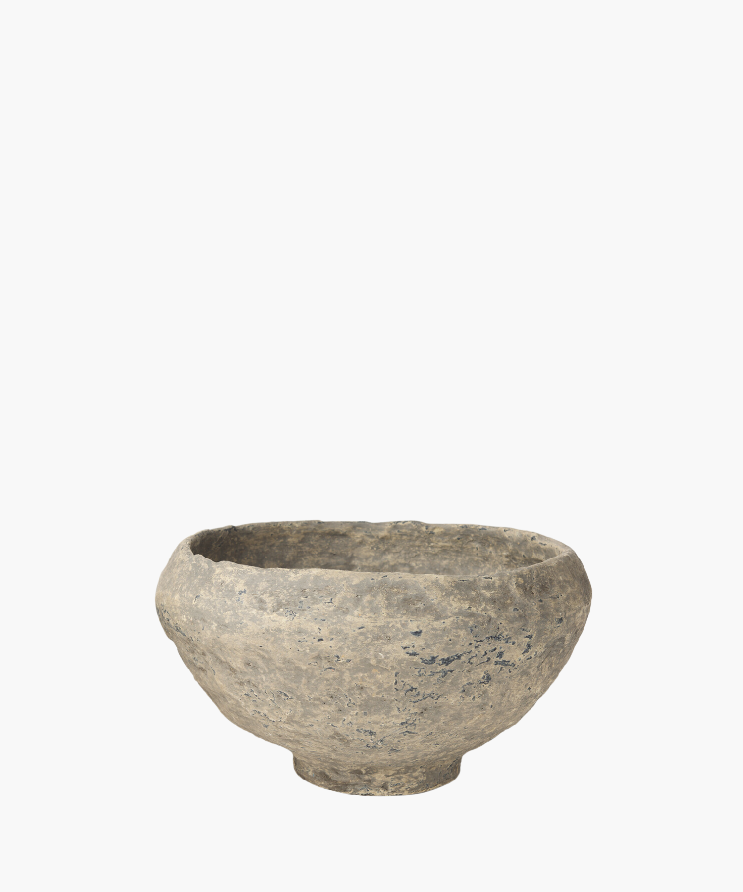 A rustic, paper mache bowl with a textured surface, showcasing shades of gray and subtle patches of darker tones. The bowl exudes an ancient, historical feel. | S.W. Home