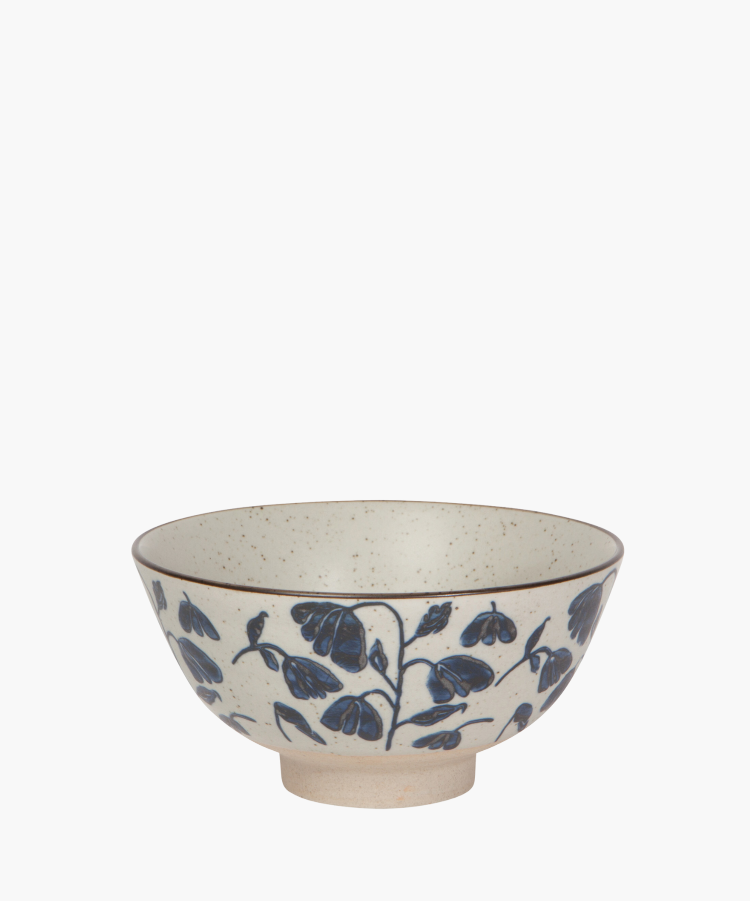 Ceramic bowl with blue floral patterns on a speckled cream background. The design is delicate and traditional, conveying a sense of elegance. | S.W. Home