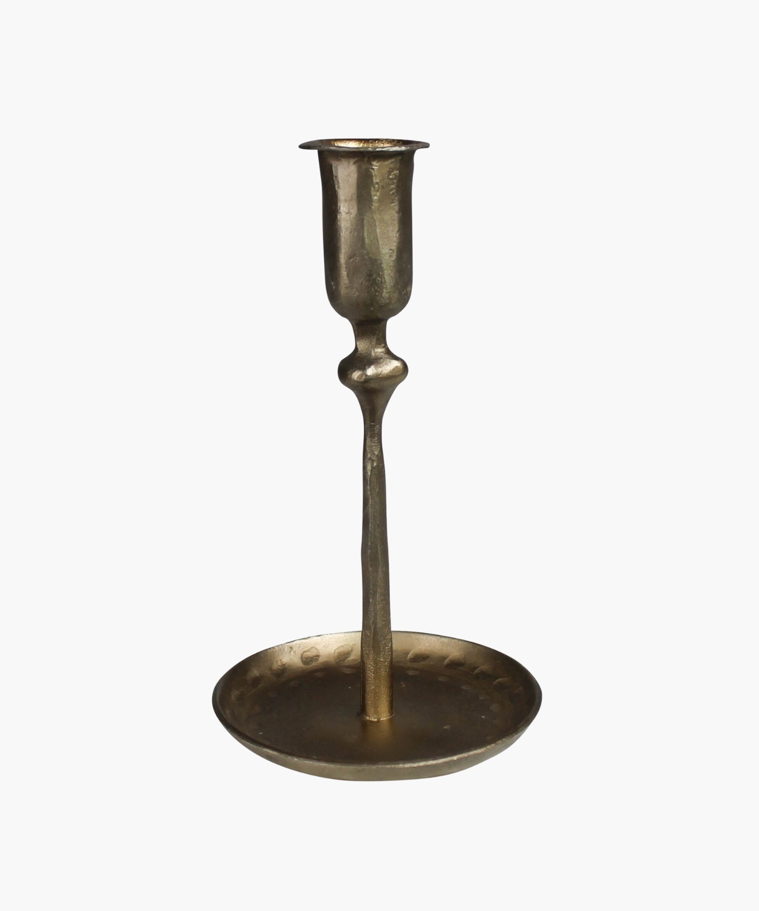 Antique inspired brass plated candle holder with a textured surface sitting on a circular base. | SW Home