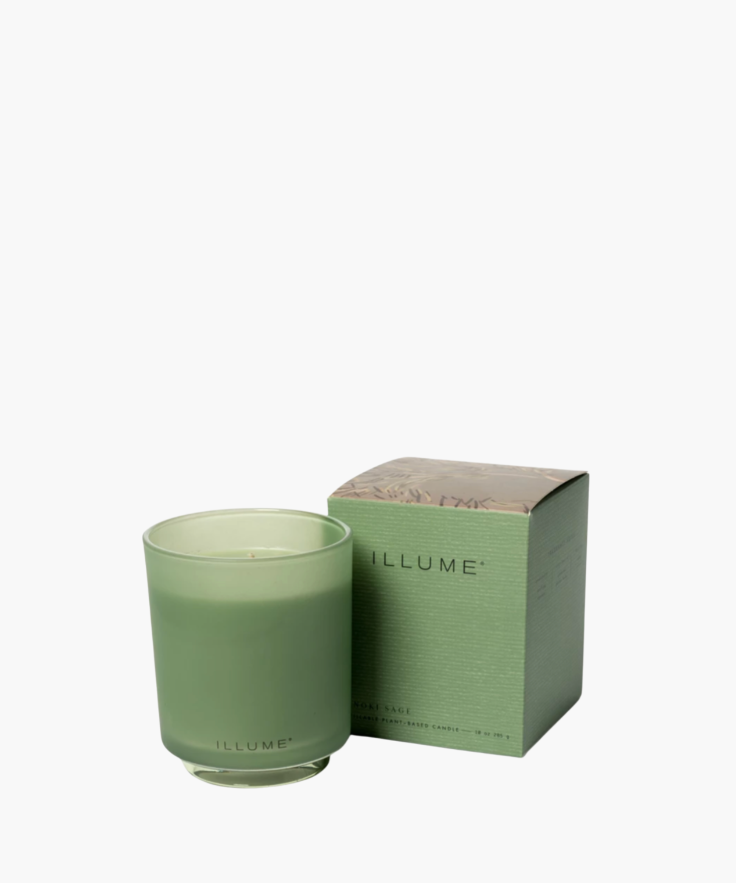 Green frosted glass candle with "ILLUME" branding beside a matching decorated box. Soft, elegant design conveys a sense of calm and sophistication. | SW Home