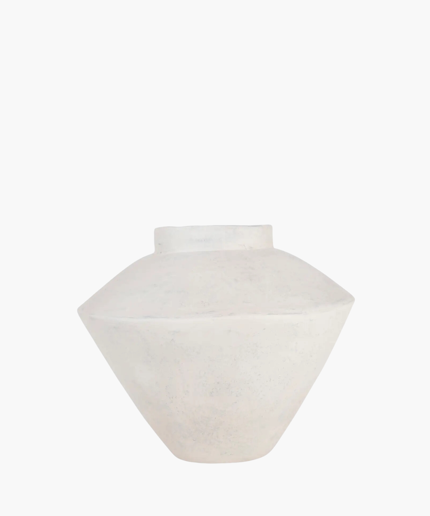 A minimalist, matte white ceramic vase with a wide, flat body and small opening, set against a plain background, conveying simplicity and elegance. | S.W. Home