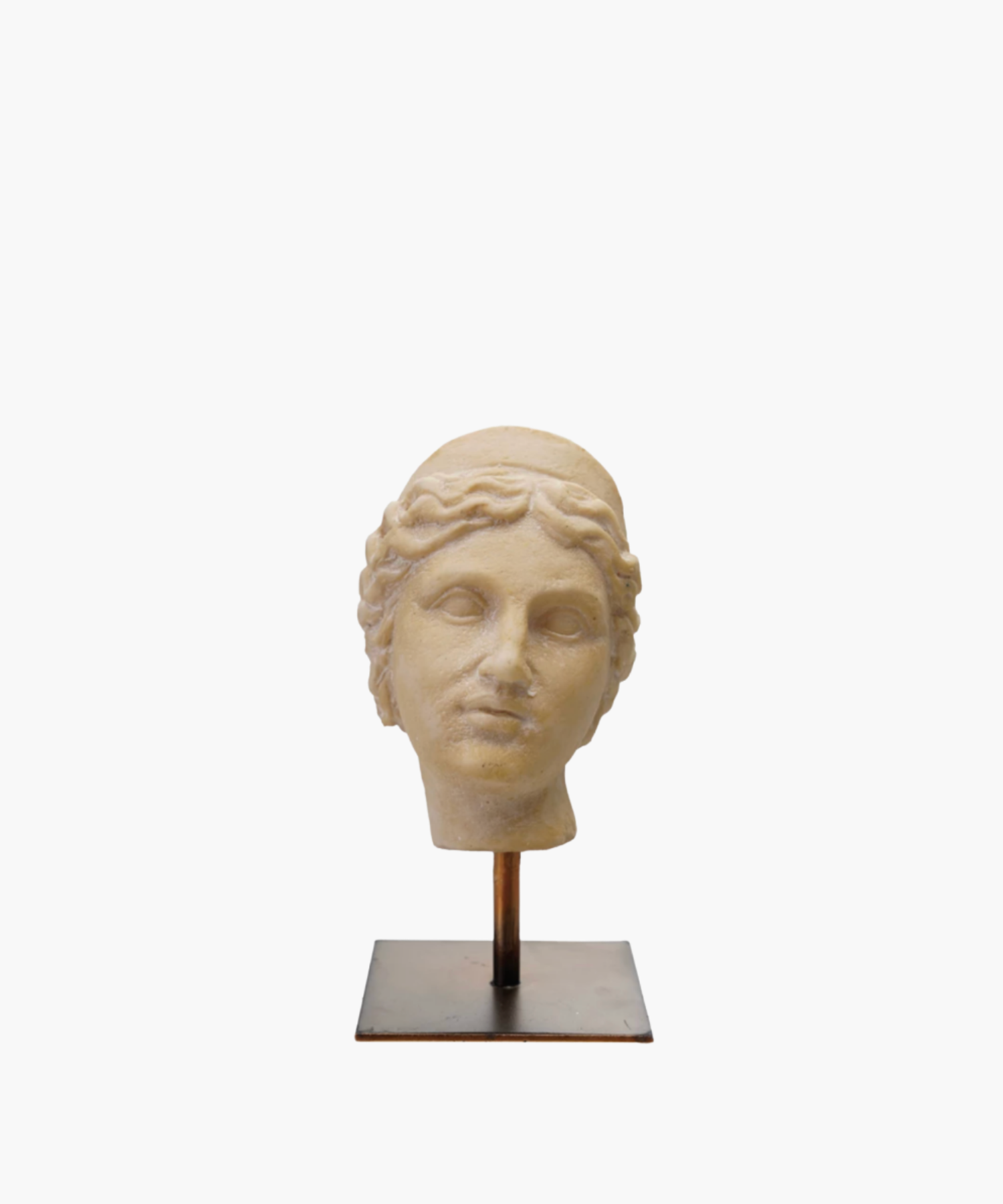 Bust of an ancient statue on a stand, depicting a serene face with wavy hair. The worn texture conveys antiquity and classical elegance. | S.W. Home