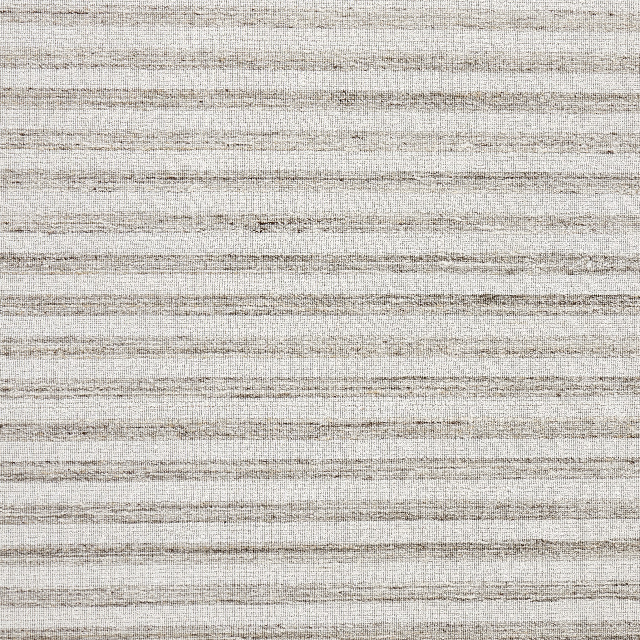 Detailed picture of strip pattern on an outdoor rug.