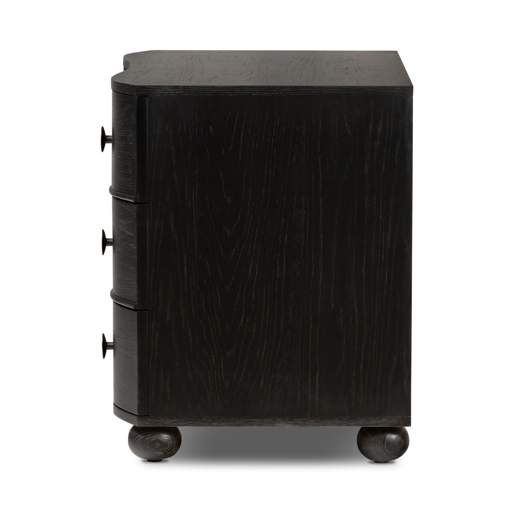 Side profile of a dark wood dresser with three drawers and round knobs on a white background.