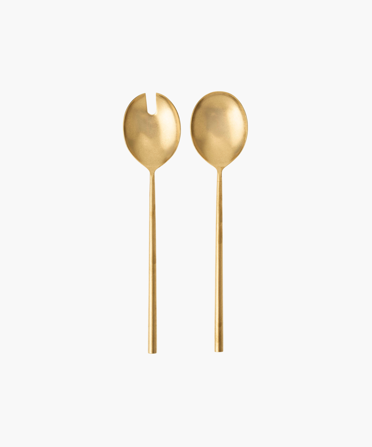 Two elegant, matte gold salad servers on a white background. One has a forked design, the other a smooth, rounded bowl. Minimalist and luxurious tone. | S.W. Home
