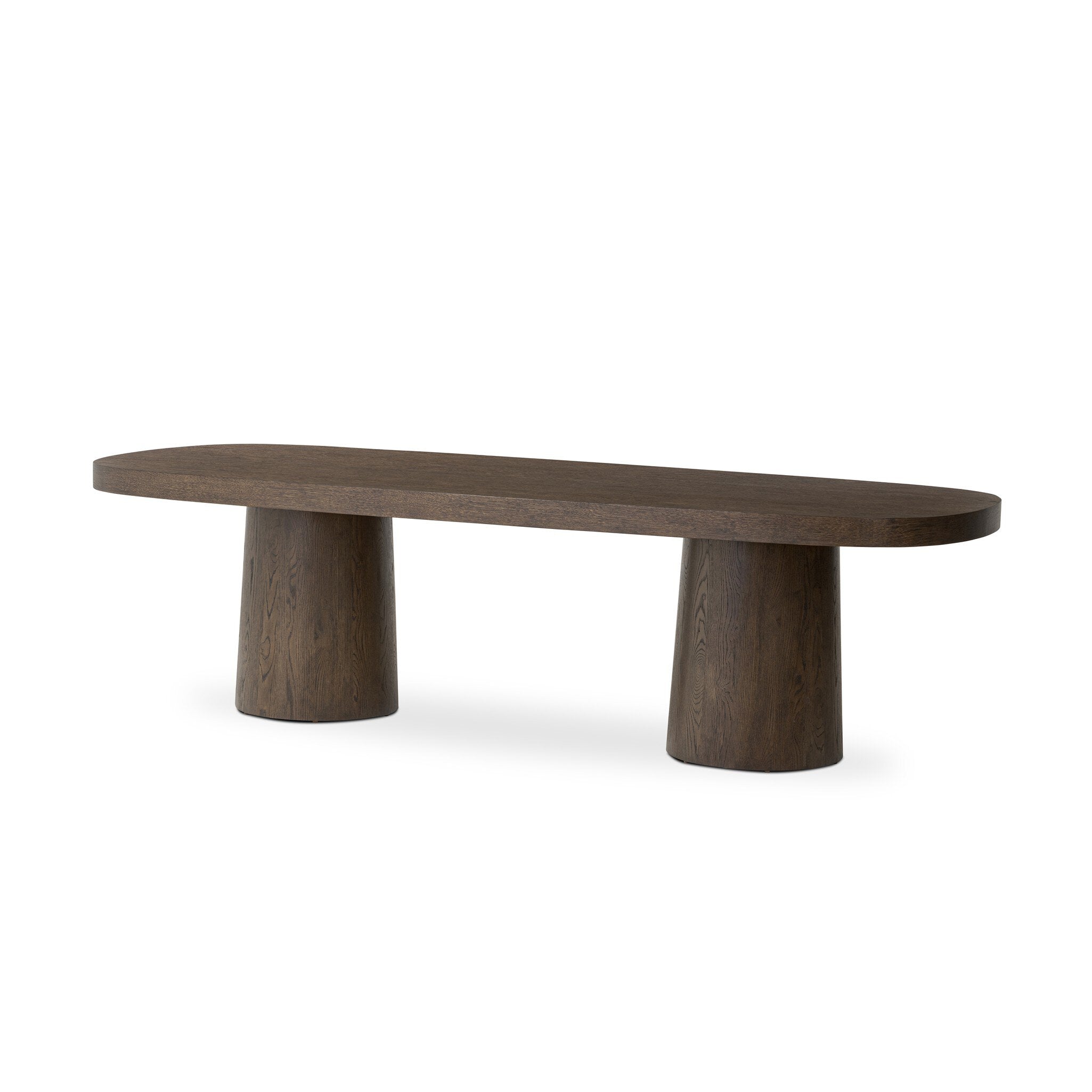 Wooden dining table with two cylindrical legs on a white background.