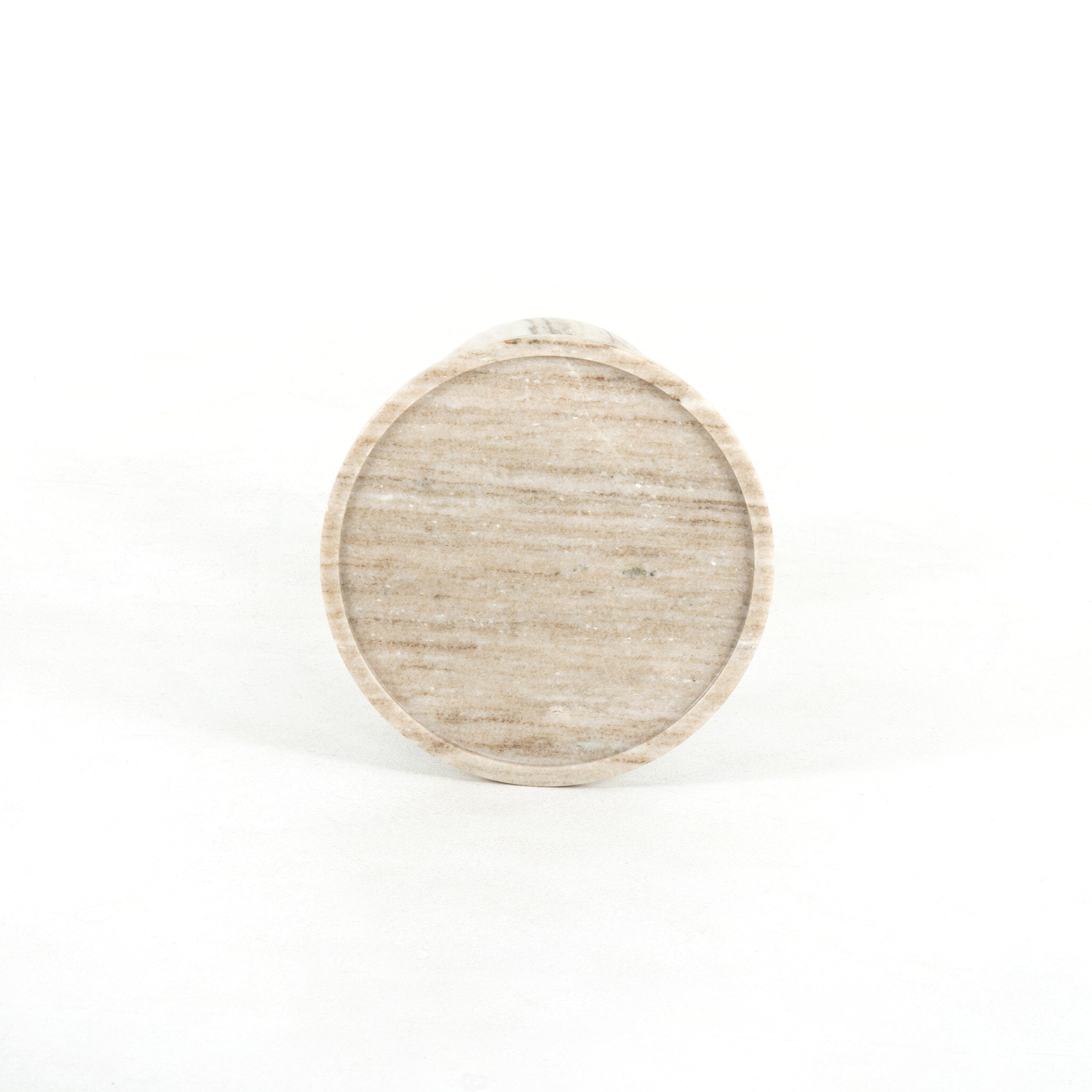 Overhead view of an accent table with marble base and round tray style top on a white background.