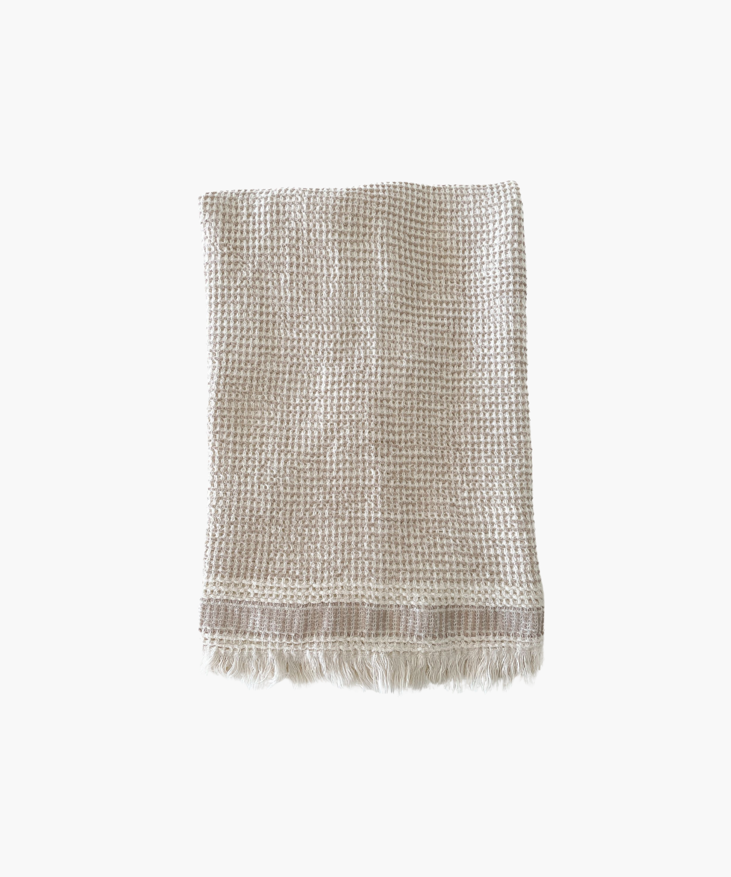A Waffle Striped Turkish Cotton Bath Towel in a beige color with a bold stripe and self fringe. | S.W. Home