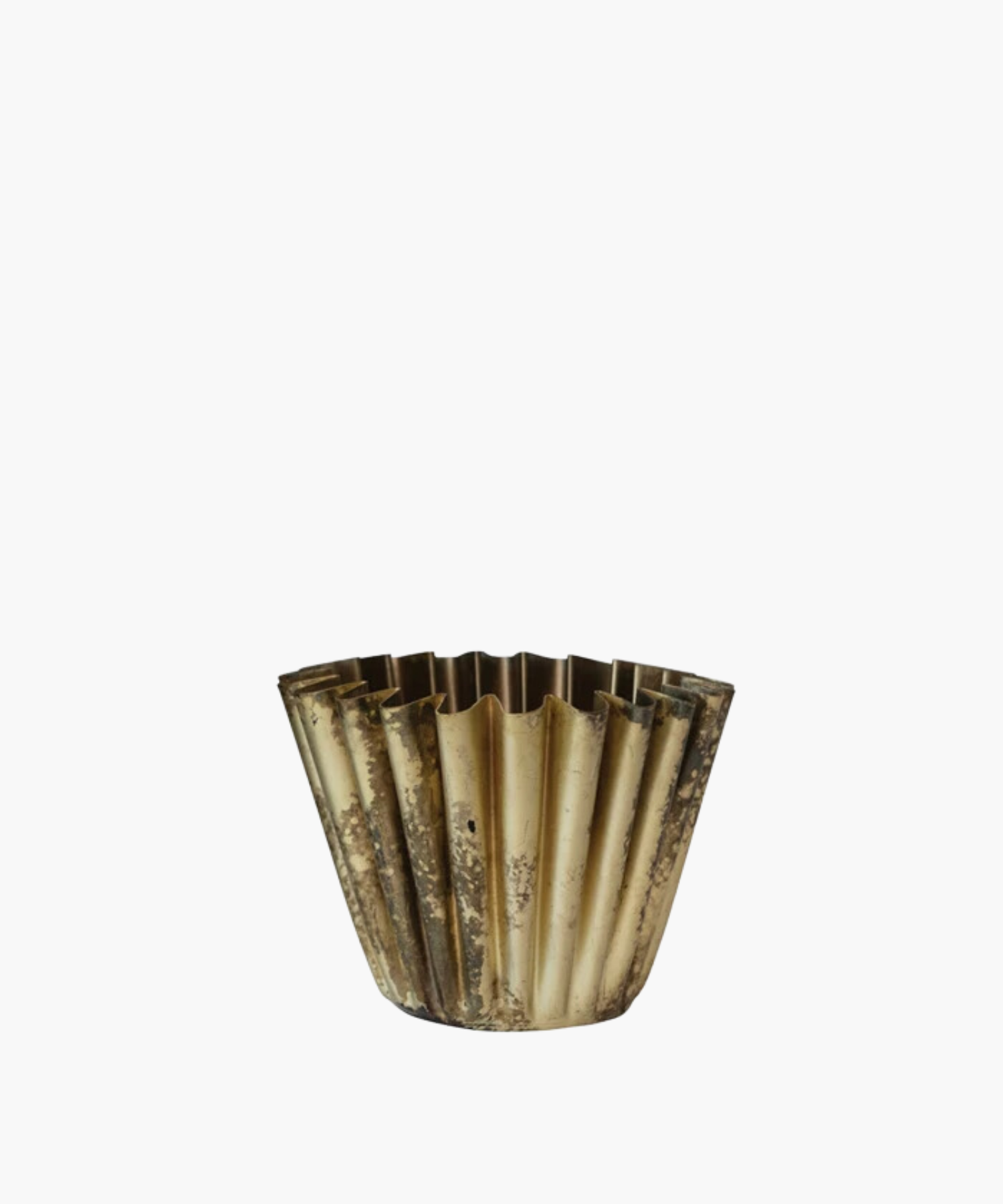 Vintage, fluted metal vessel with a weathered bronze finish. The corrugated design creates a fan-like pattern, evoking an industrial yet artistic feel. | S.W. Home