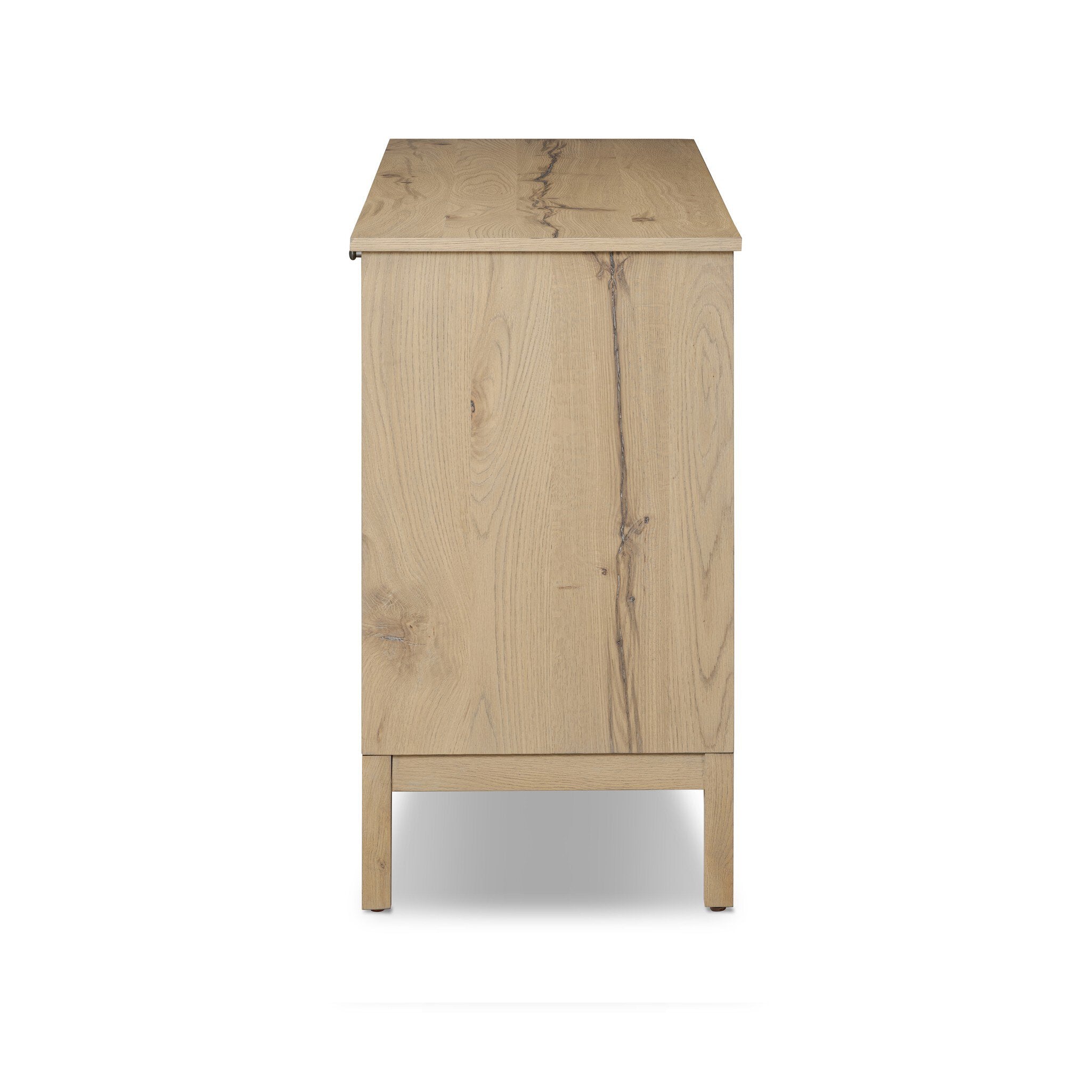 Side profile of a wood sideboard with a grid like pattern on the doors on a white background.