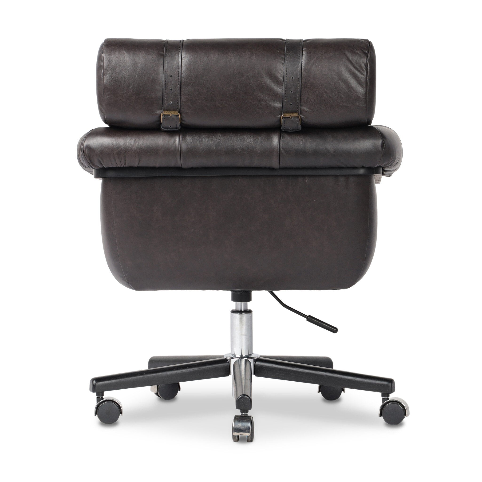 The back of a tufted black leather desk chair with a chrome and black base on a white background. 