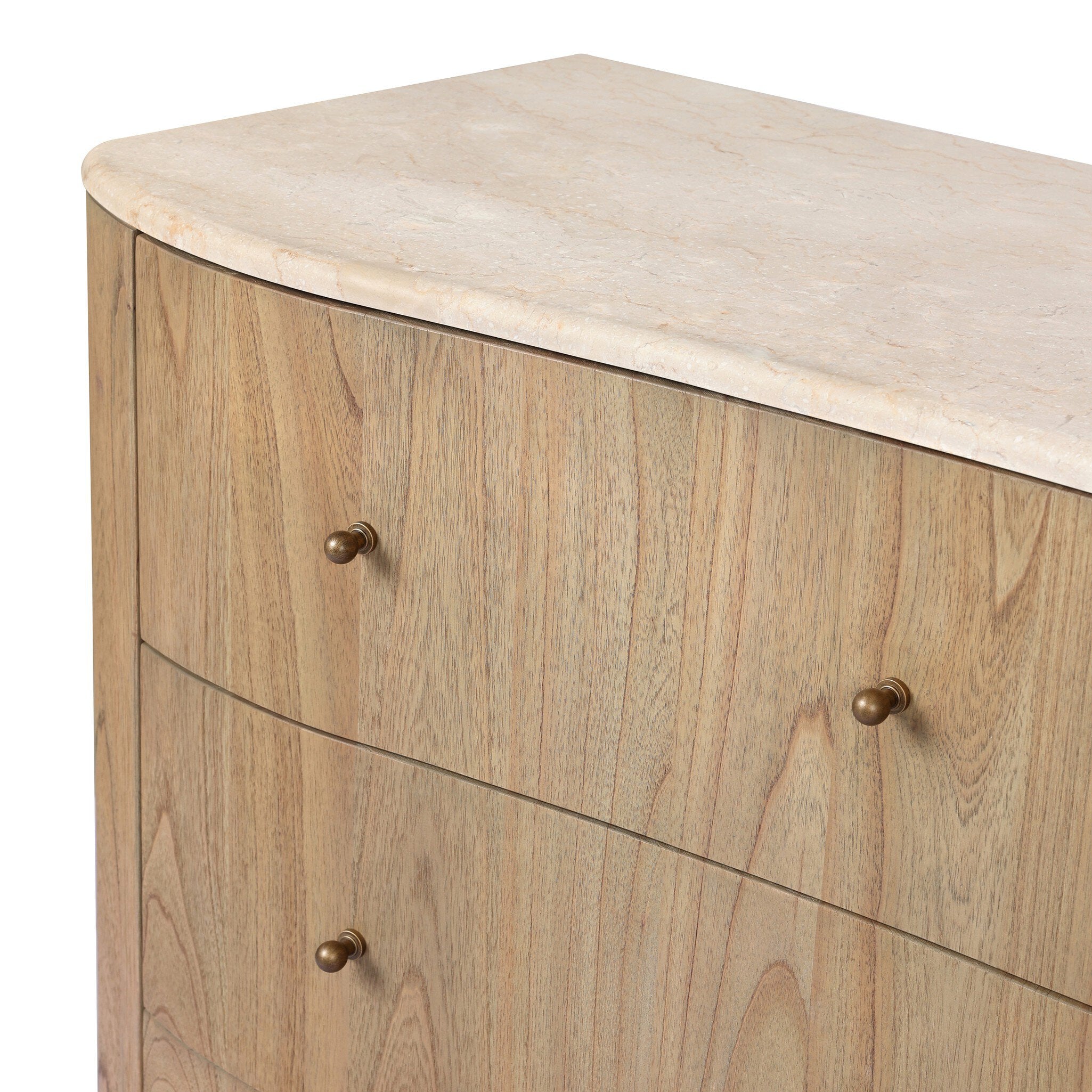 Close up of a wooden dresser with six drawers and topped with cream-white marble on a white background.