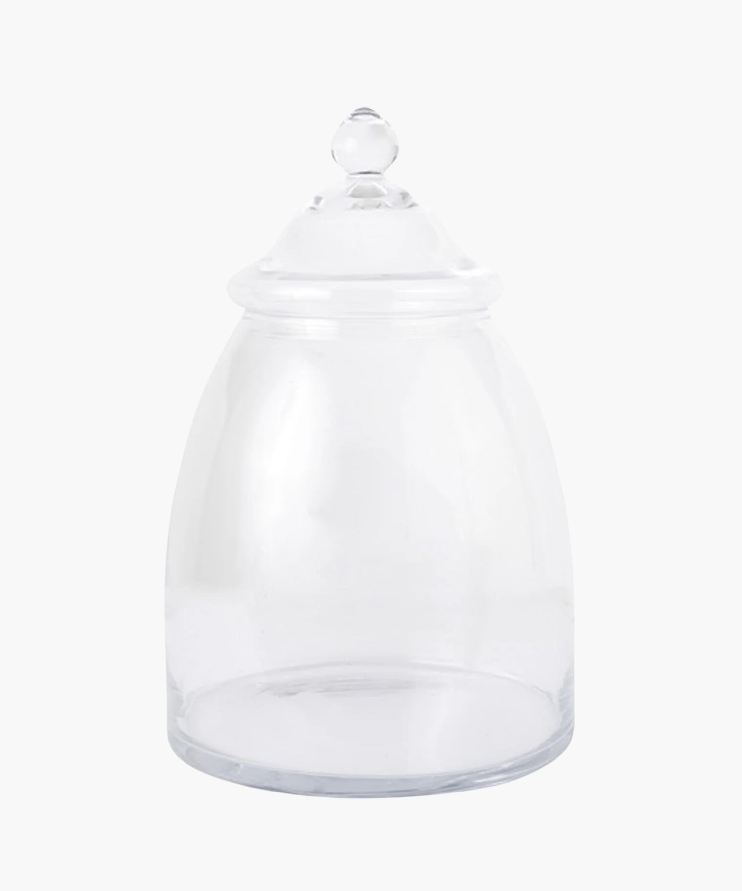 A clear glass apothecary jar with a domed lid and rounded knob. The jar is empty, evoking a sense of simplicity. | S.W. Home