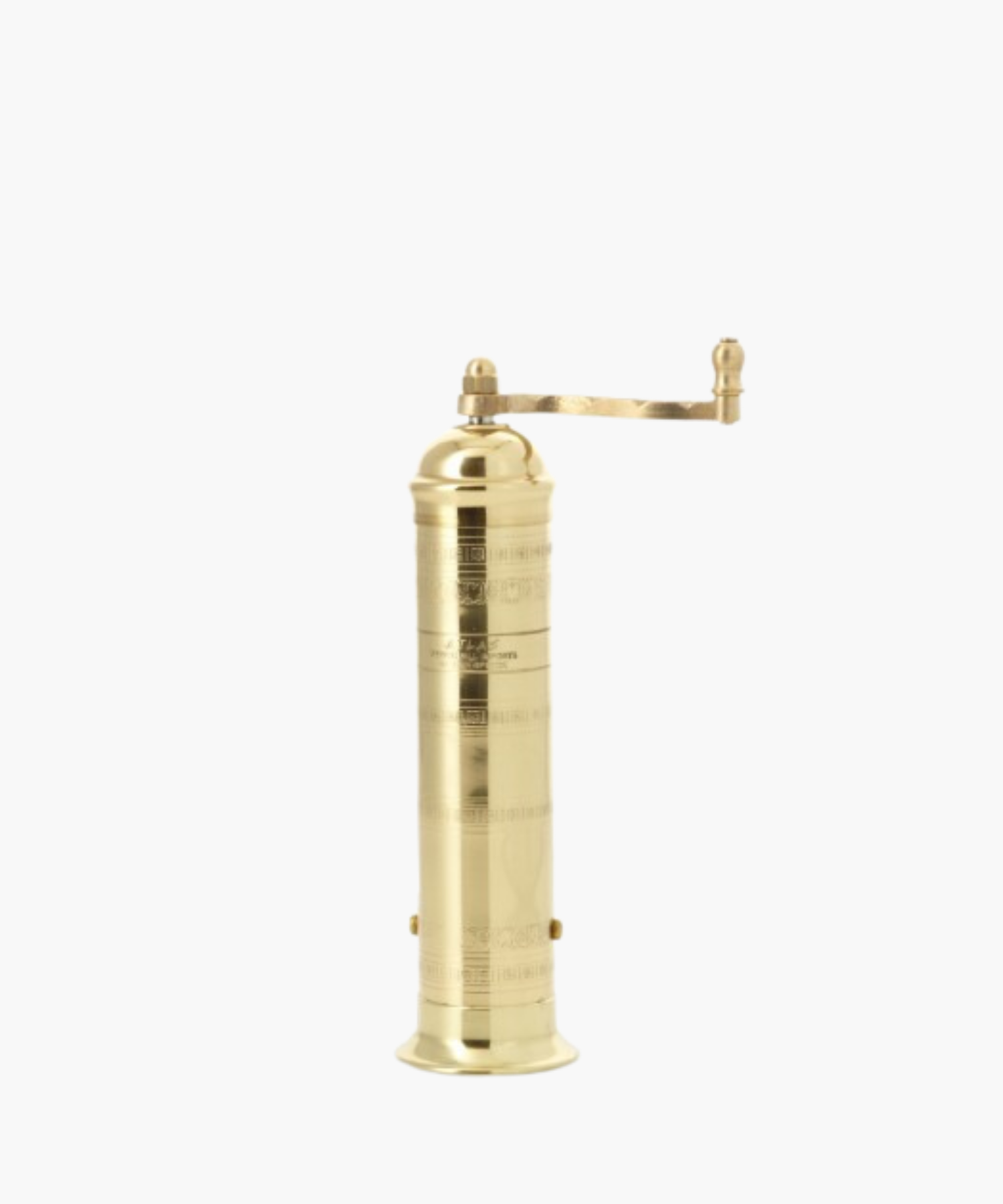 Tall, cylindrical brass pepper mill with a decorative pattern and a side handle, conveying elegance. | S.W. Home