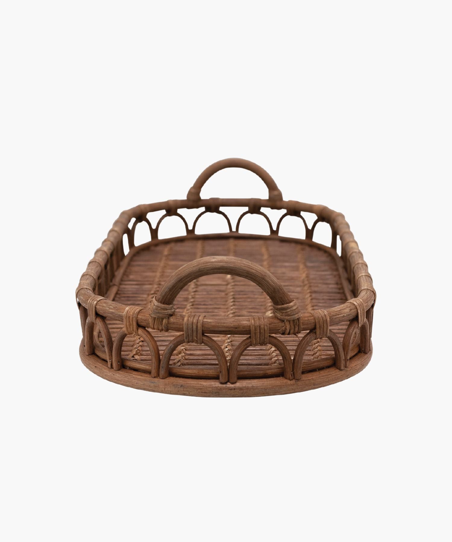 An oval hand-woven rattan tray with rounded handles on each side, featuring an intricate woven pattern. The warm brown color exudes a rustic, natural charm. | SW Home