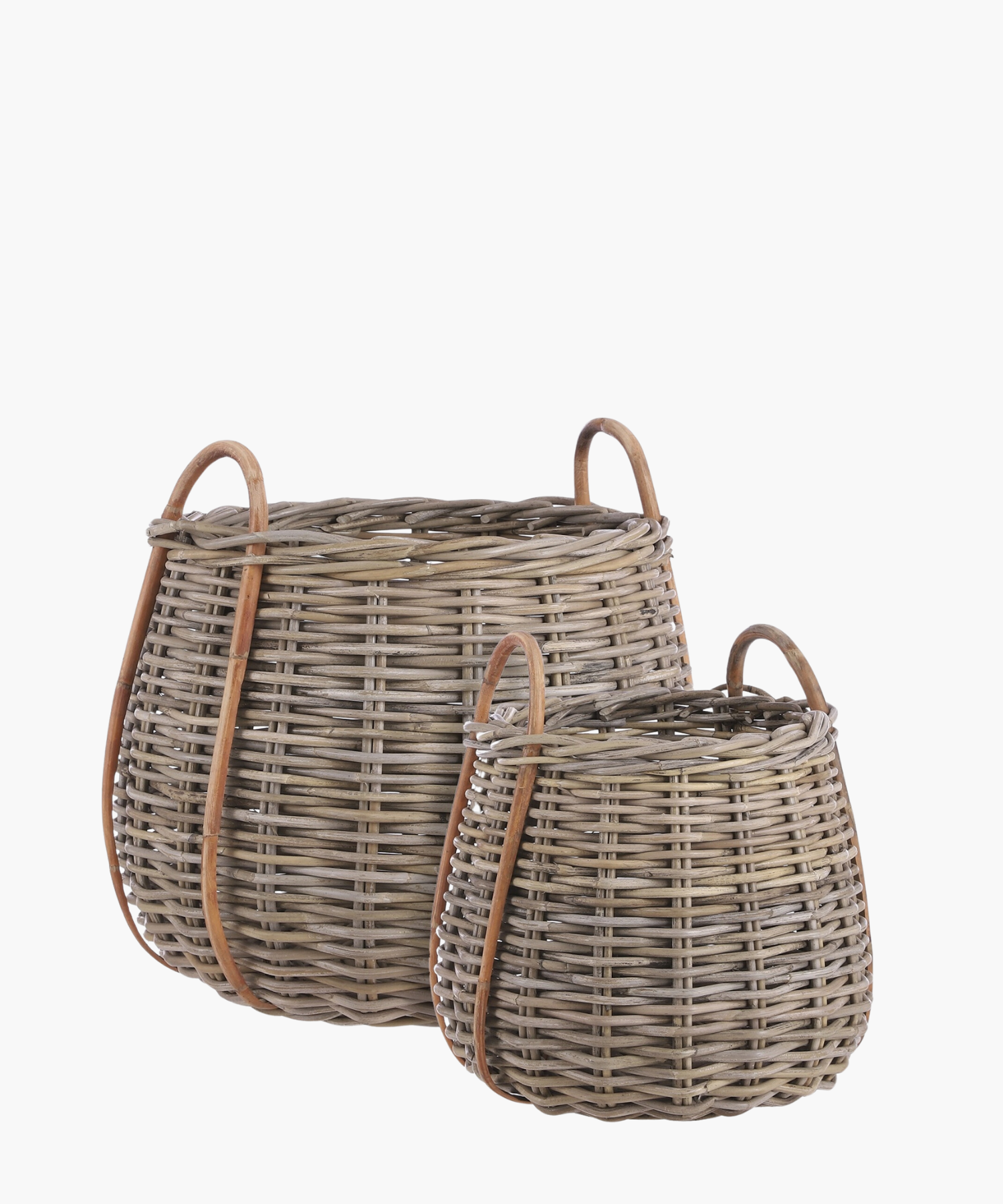 Two wicker baskets with curved wooden handles. The baskets vary in size, with a rustic texture and earthy tones, conveying a natural, cozy feel. | S.W. Home