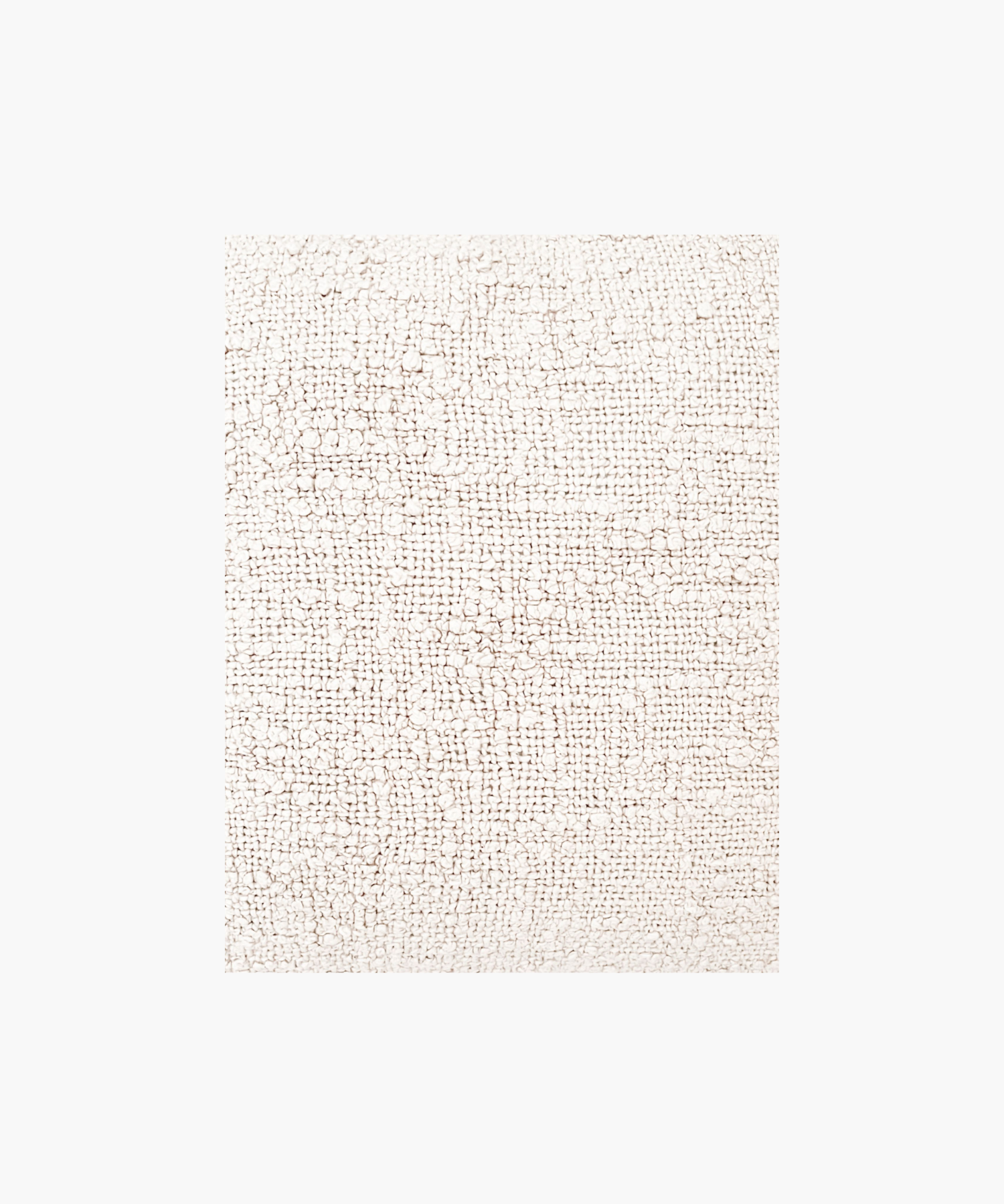 A detailed picture of a pillow in a soft ivory color, featuring a textured woven boucle pattern. The design gives a cozy, inviting feel, ideal for home decor. 