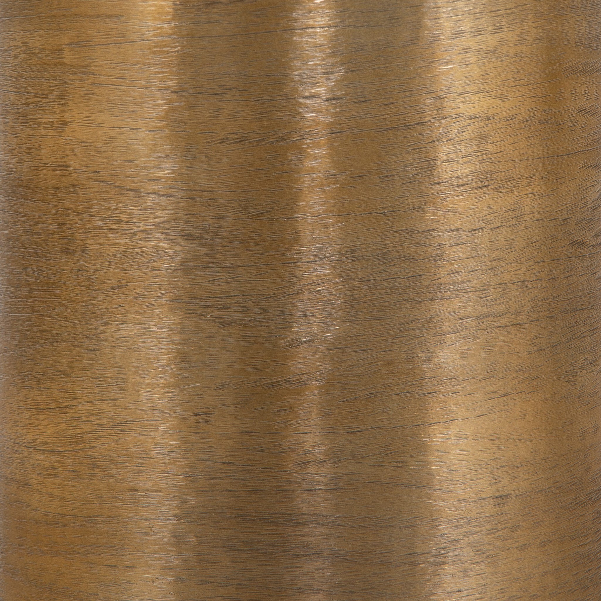 Close-up of the brass metal base showing its color and texture. 