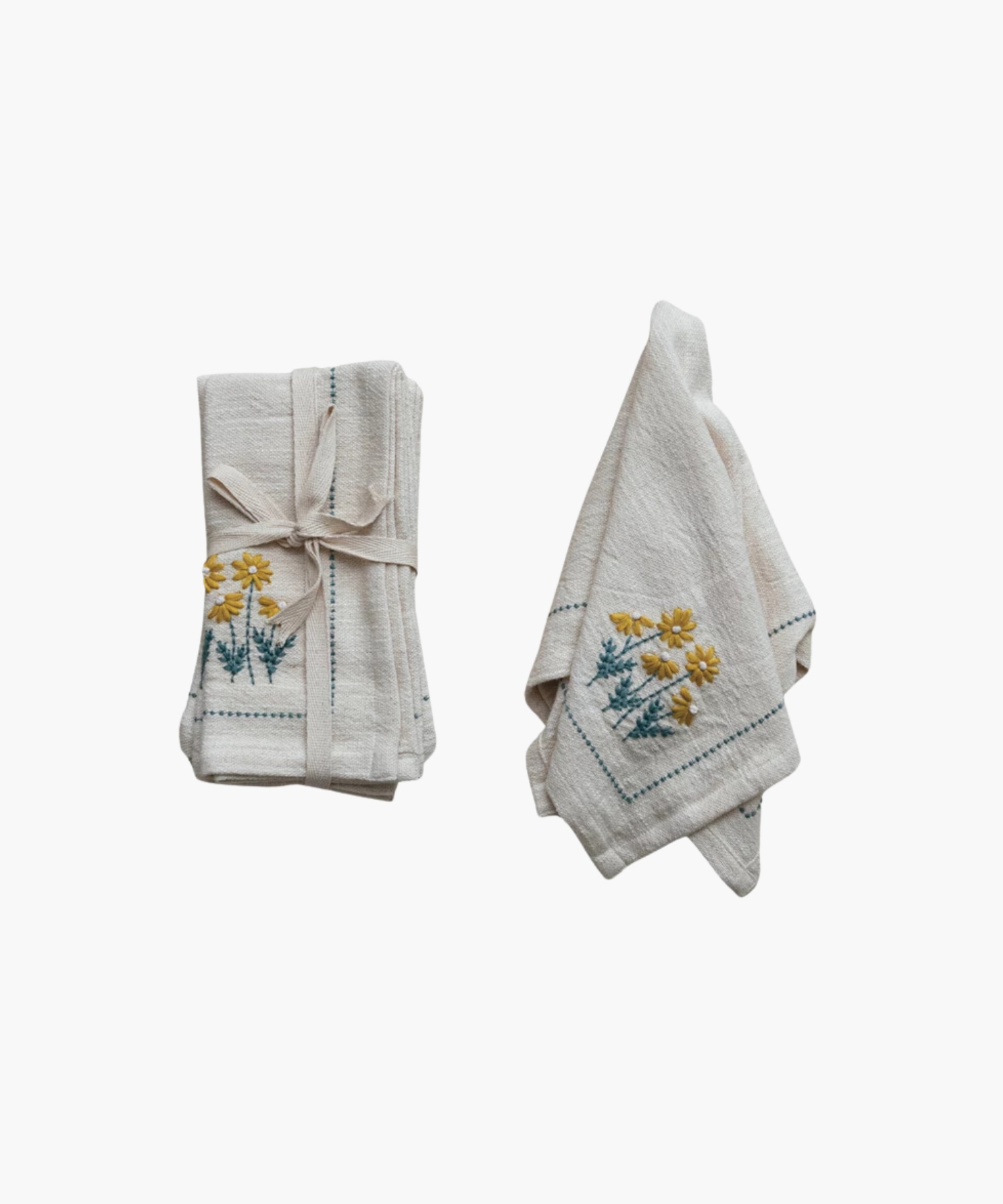 Floral Napkin styled as a set of four and individually showing its neutral color and embroidered floral print. | S.W. Home