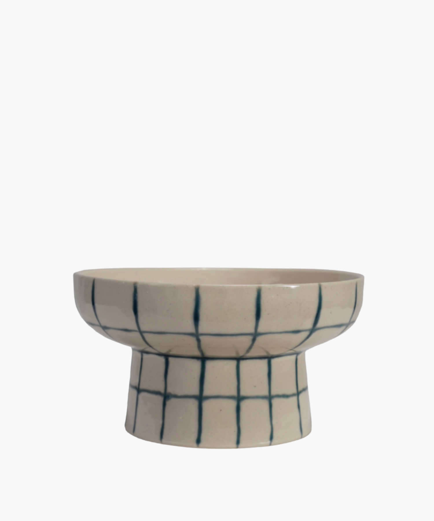 A beige ceramic pedestal bowl with a wide rim, featuring a blue grid pattern. The design is simple and modern, conveying a minimalist aesthetic. | Wildwood Home Co. 