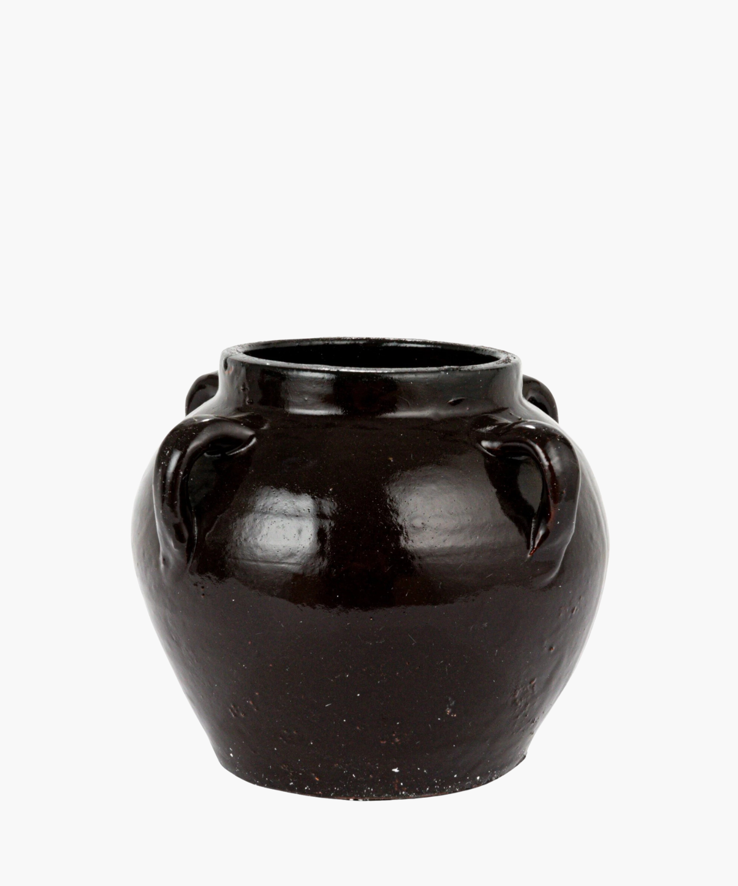 A small vintage-inspired shiny, black ceramic pot with a wide, rounded body and a narrow open top. It features four delicate small loop handles and a smooth surface. | S.W. Home