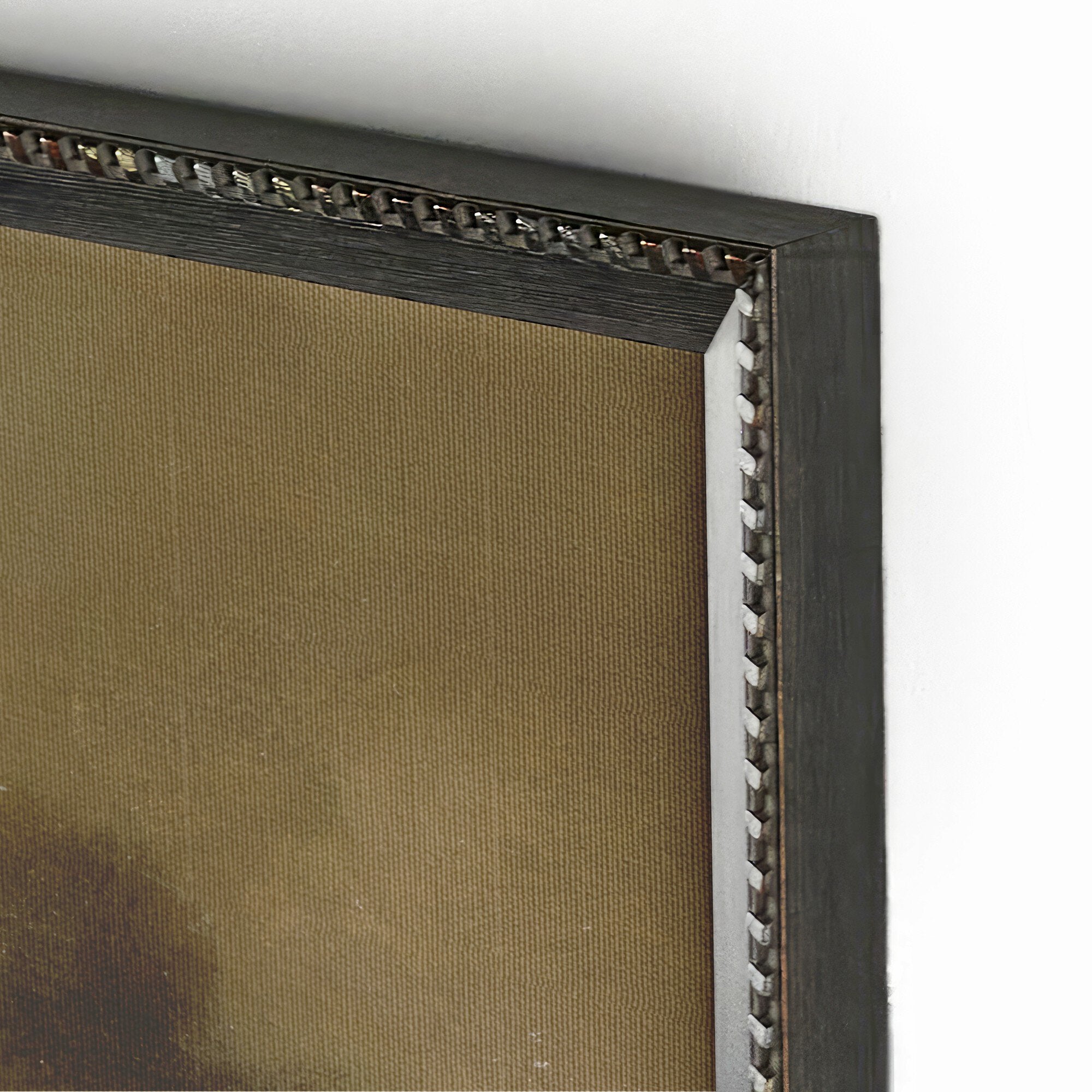 Close-up of a dark wooden picture frame with decorative elements on a white background. | Wildwood Home Co.
