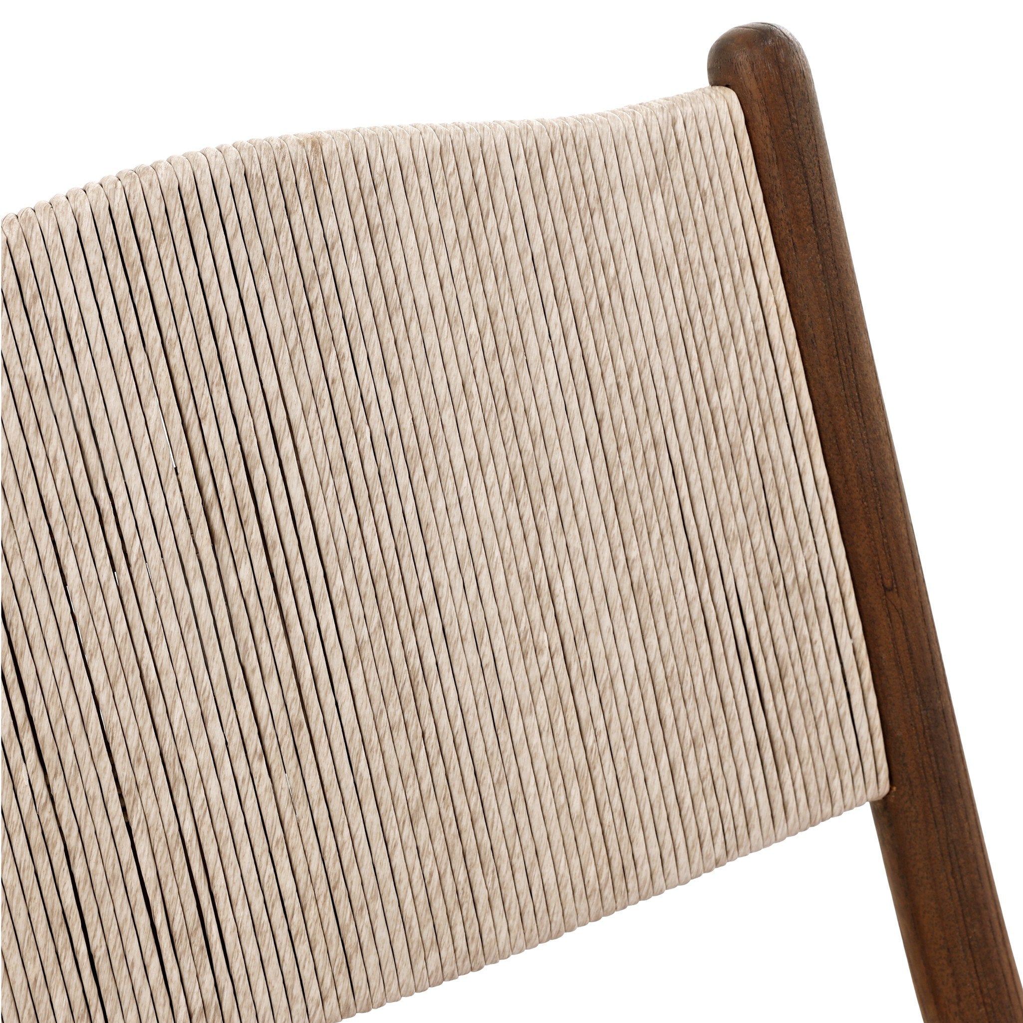 Close up of the woven pattern from the back of the outdoor dining chair. 
