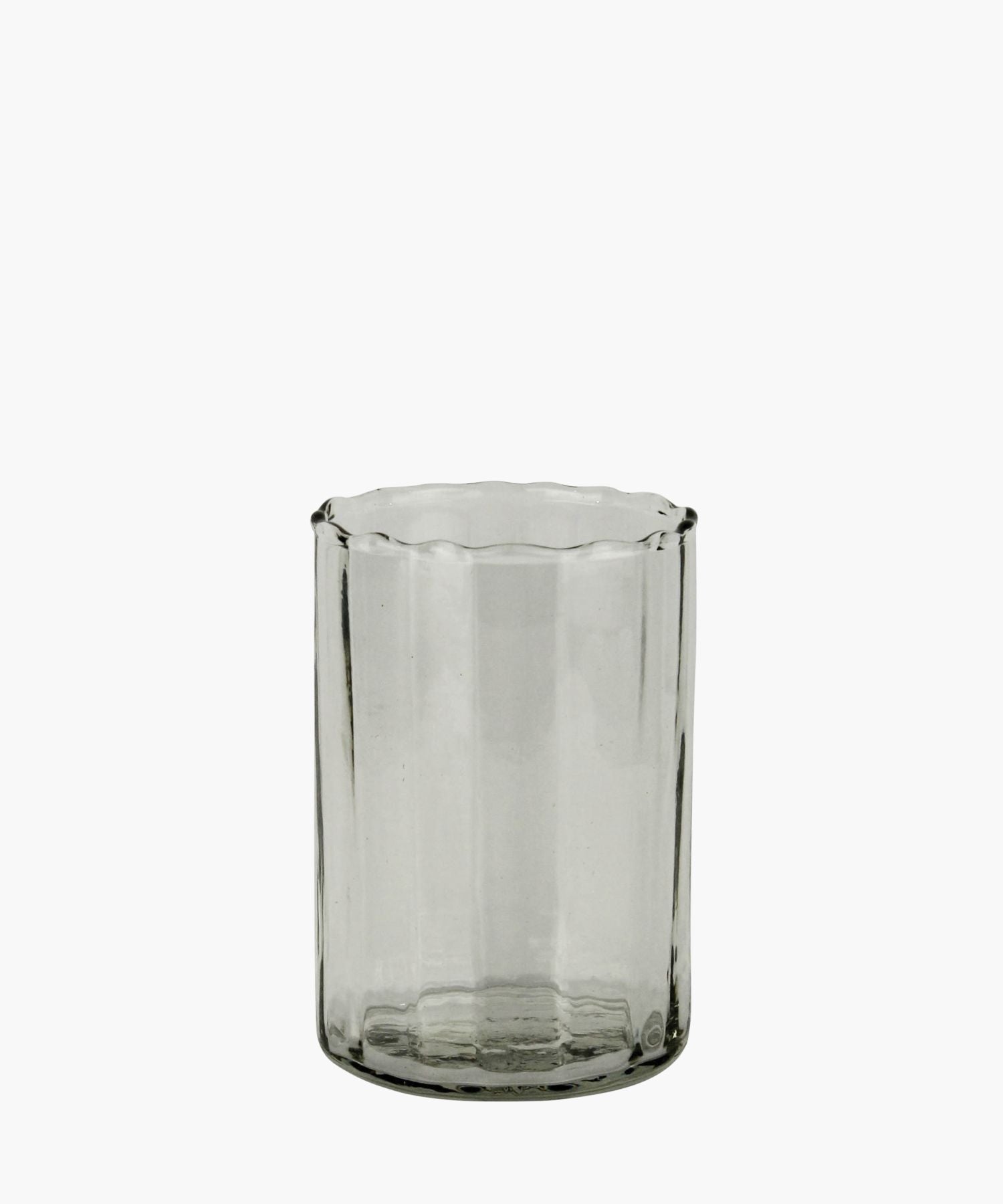 Clear Cylindrical glass with ribbed texture on a white background. | SW Home