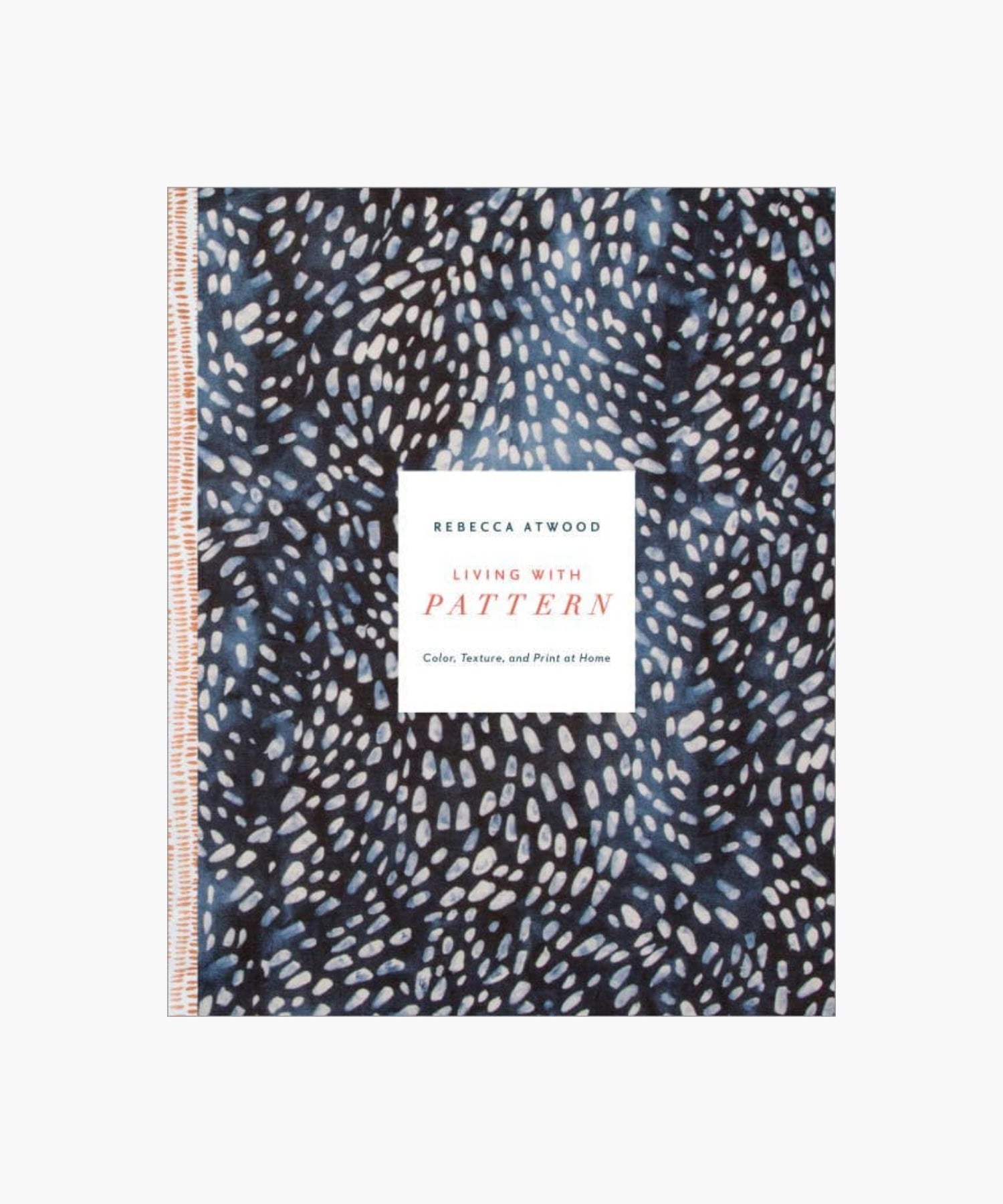 The cover of the book "Living with Pattern" by Rebecca Atwood featuring a navy blue background with white abstract dots and a central white text box. | S.W. Home