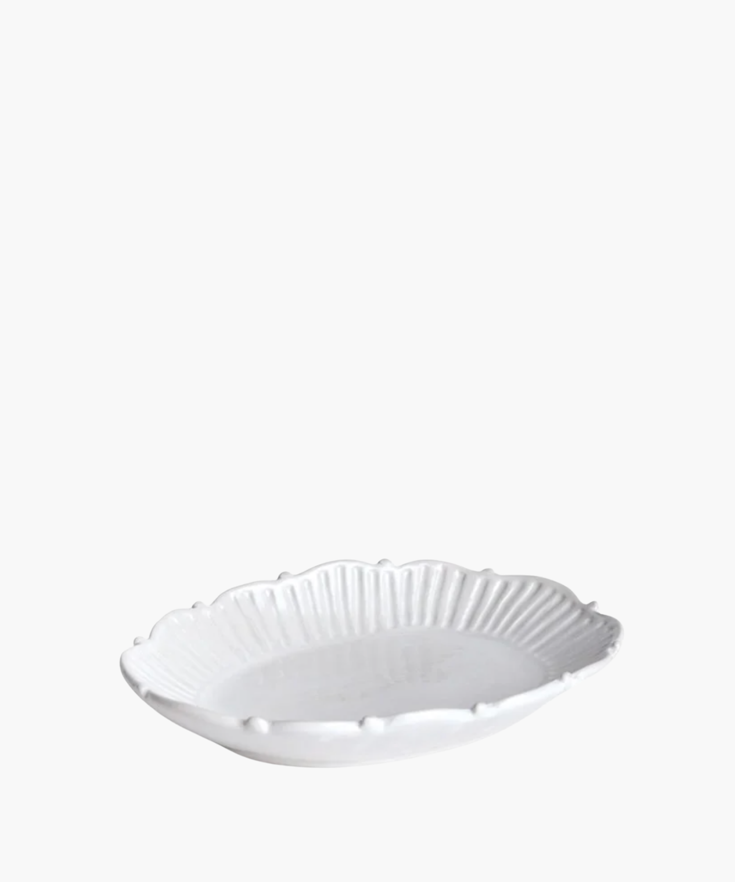 Small white ceramic catchall tray with a decorative rim. | SW Home