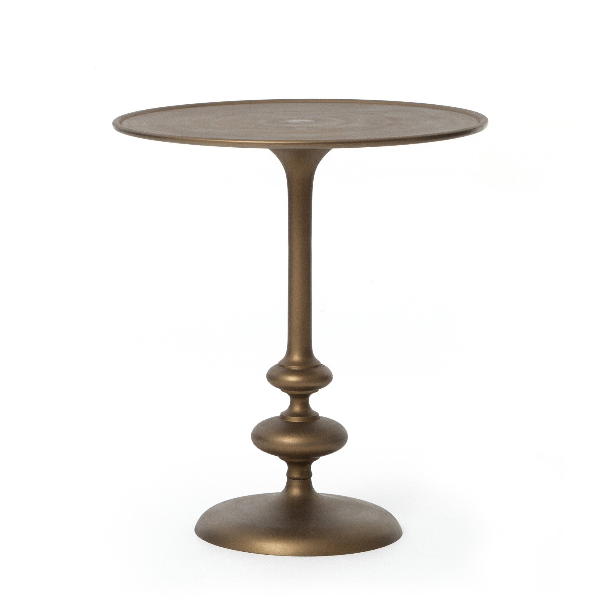 Brass finished pedestal table on a white background. | S.W. Home