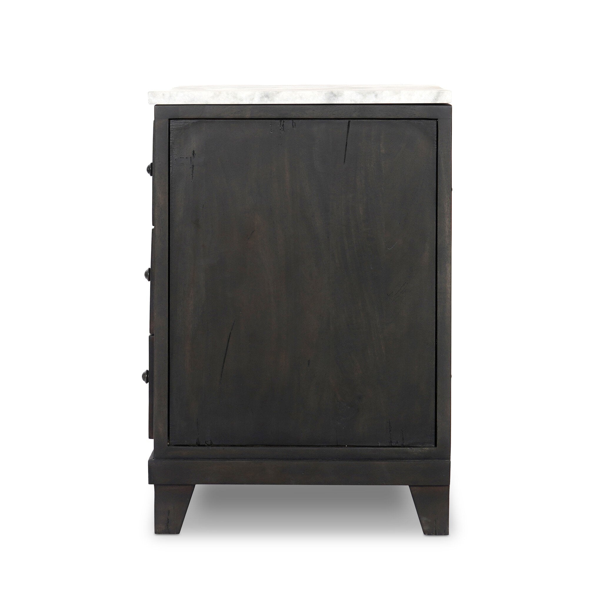 Side profile of a dark wood stained nightstand with three drawers and a marble top. 